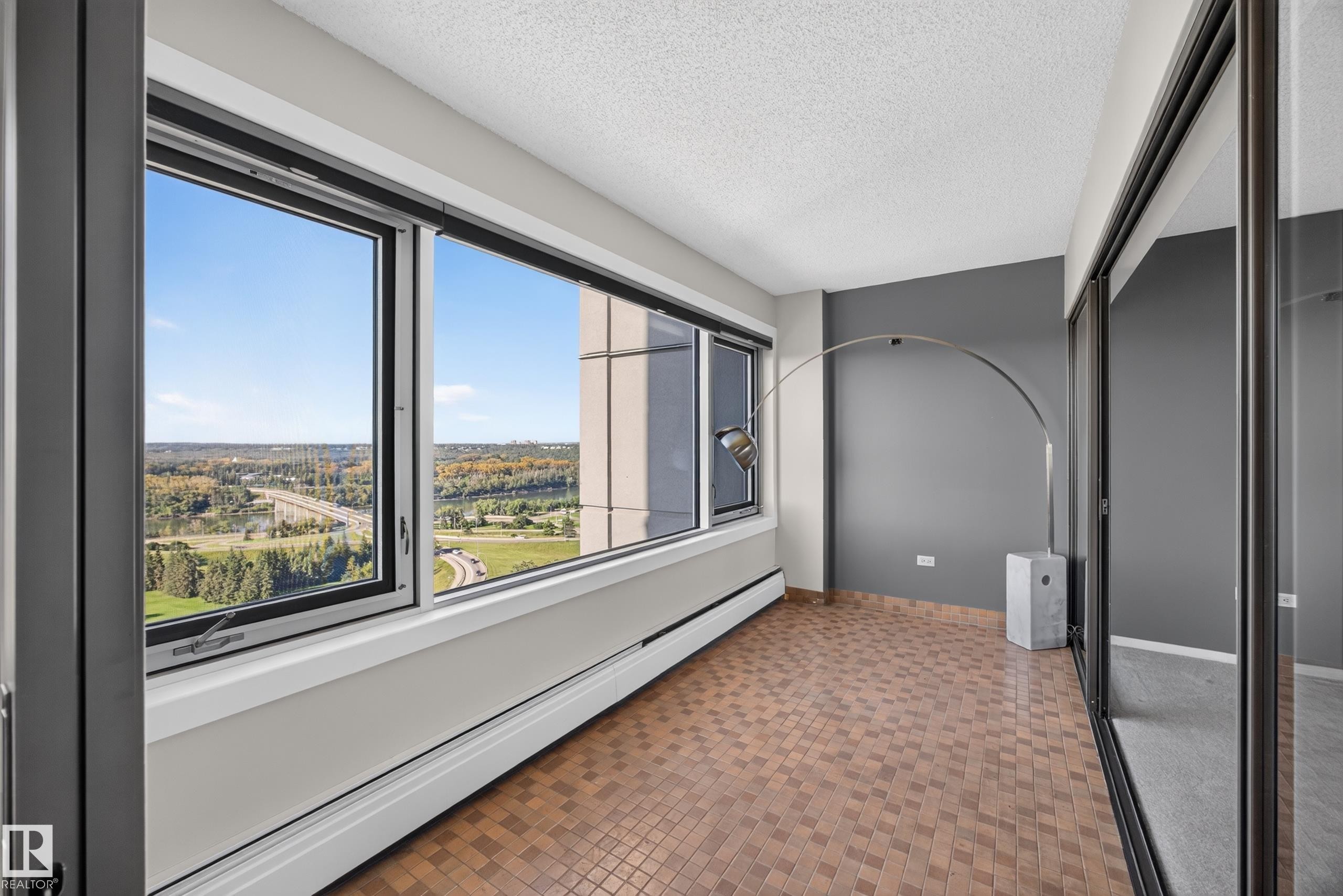 Flex space separated from the Living Room and Bedroom by glass sliding doors. Home office, library, or simply a stunning place to unwind. - #803 10011 123 St Nw, Edmonton, AB