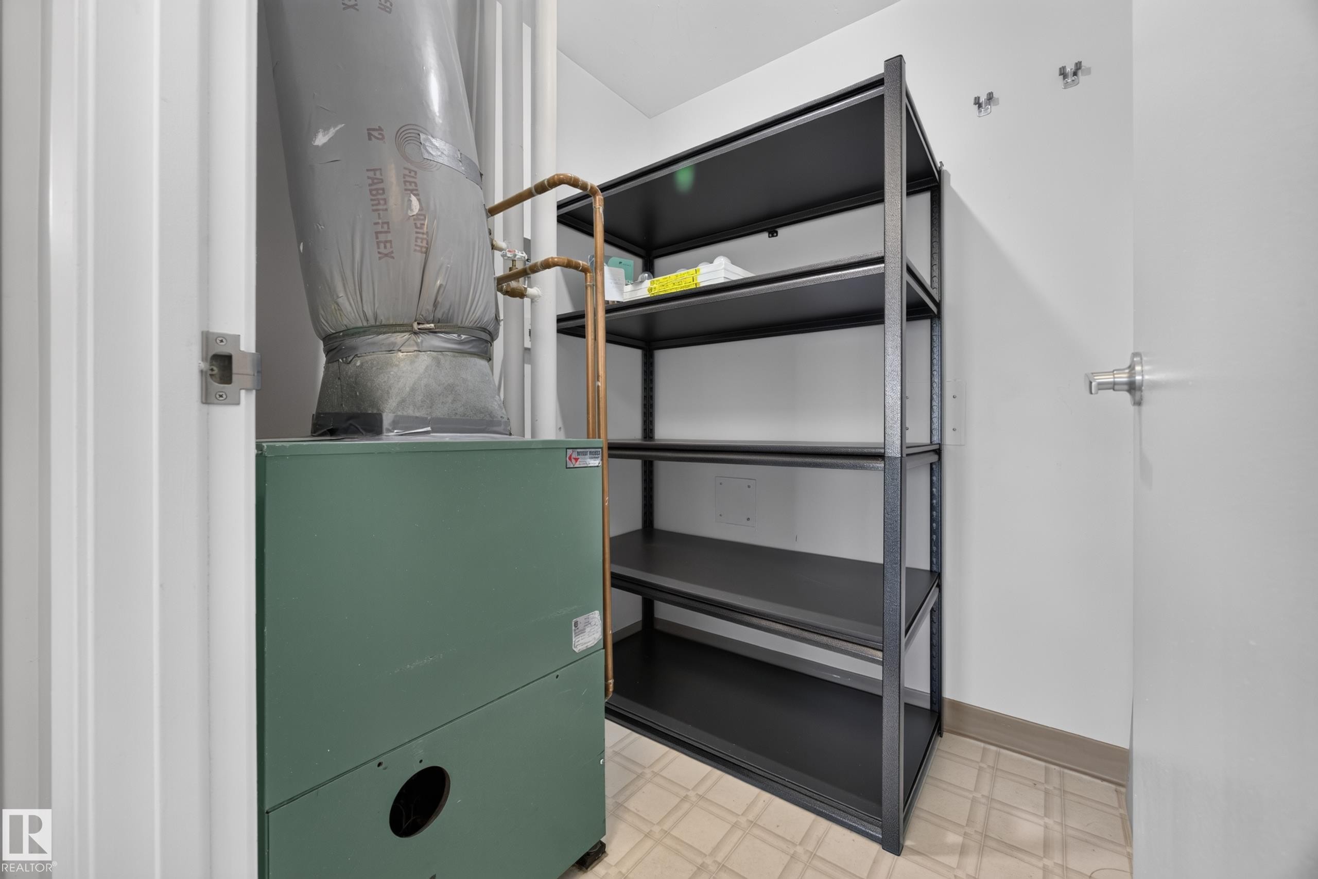 Storage and Furnace Room featuring shelving. - #803 10011 123 St Nw, Edmonton, AB