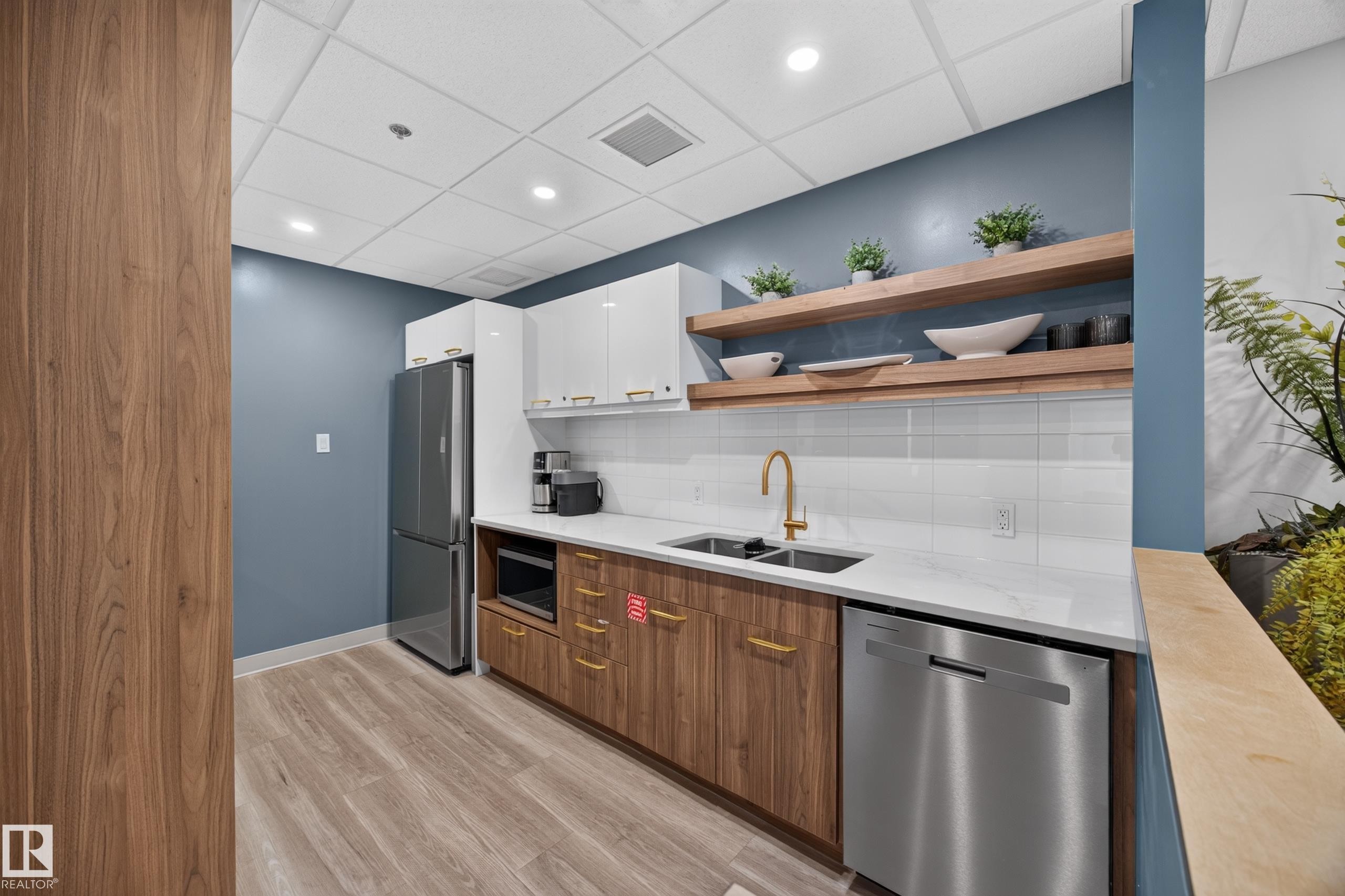 Condo Building Social Room Space featuring Kitchen, Dining Room Space, Multiple Lounge Spaces, two Bathrooms, and access to outdoor common space. - #803 10011 123 St Nw, Edmonton, AB