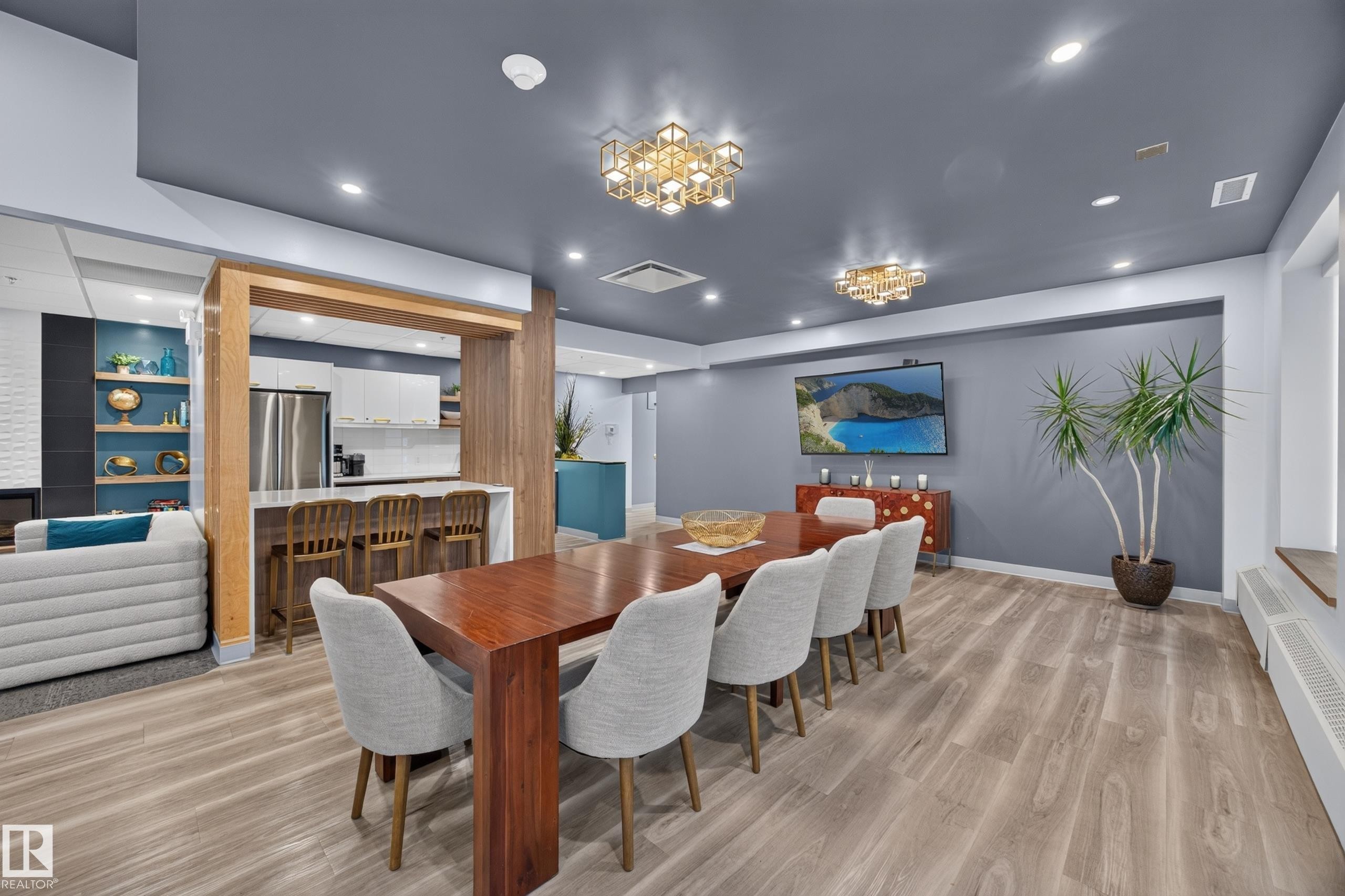 Condo Building Social Room Space featuring Kitchen, Dining Room Space, Multiple Lounge Spaces, two Bathrooms, and access to outdoor common space. - #803 10011 123 St Nw, Edmonton, AB
