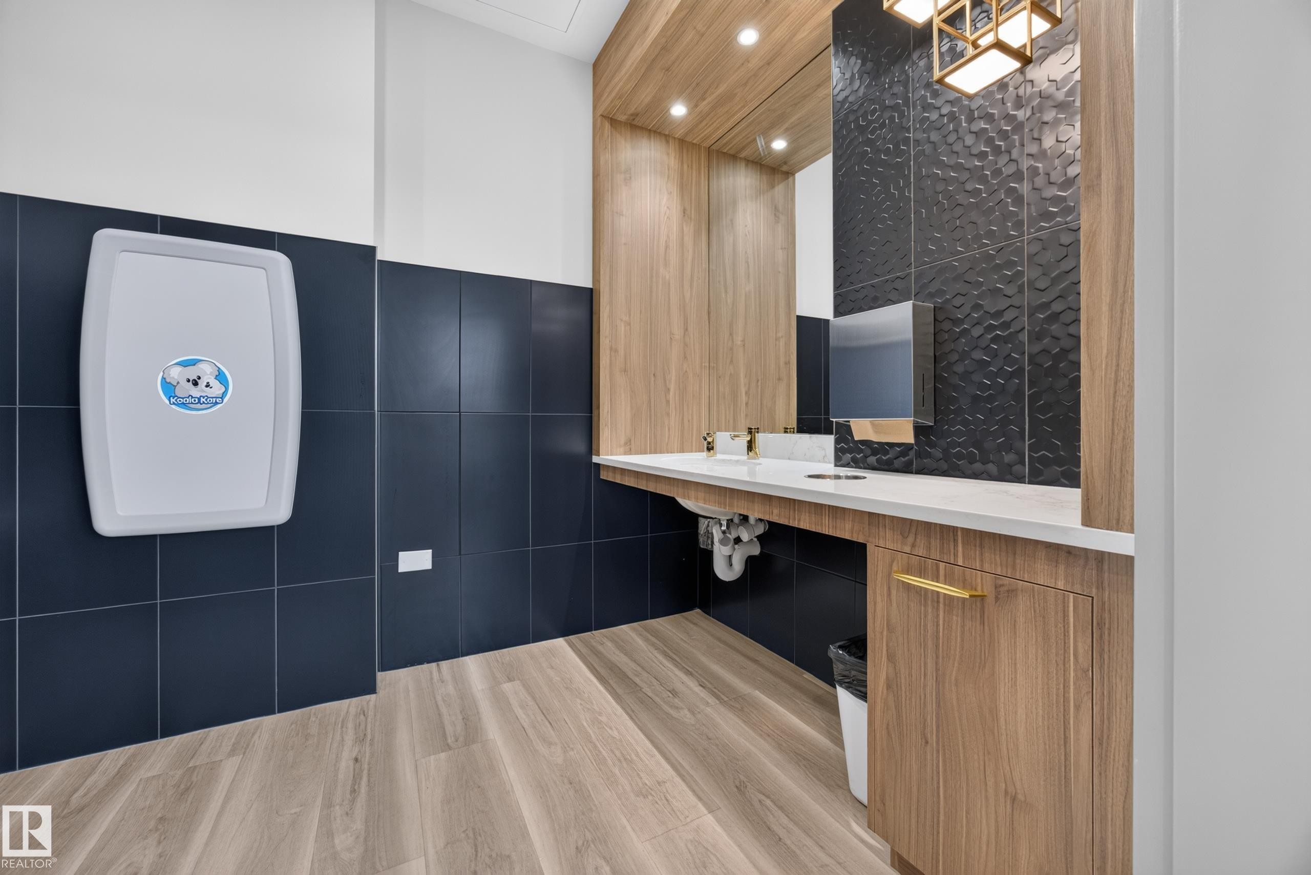 Condo Building Social Room Space featuring Kitchen, Dining Room Space, Multiple Lounge Spaces, two Bathrooms, and access to outdoor common space. - #803 10011 123 St Nw, Edmonton, AB