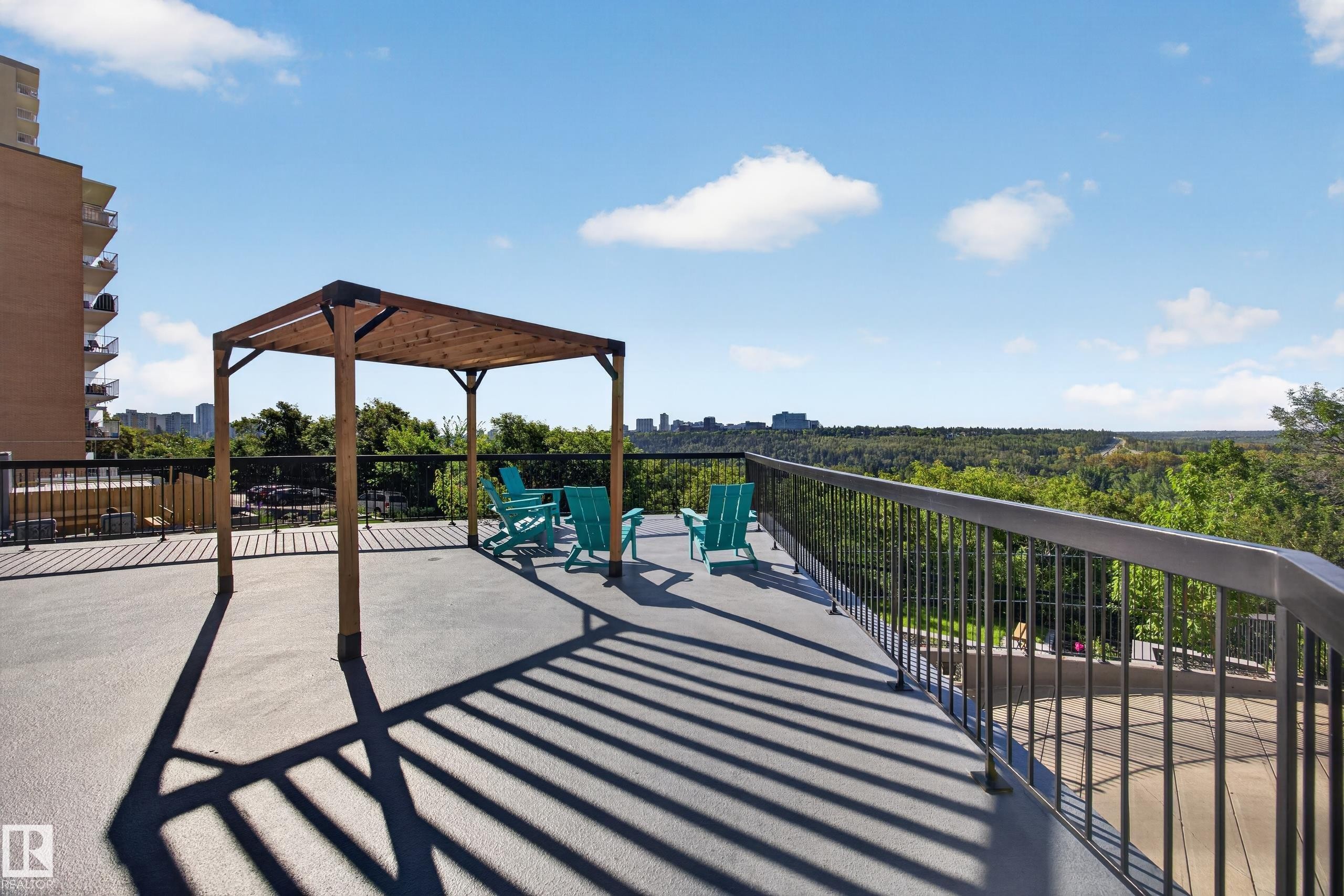 Condo Building Outdoor Common Space featuring Resident BBQ Area, Gazebo, Sitting Areas, Beautiful Landscaping, and Stunning River Valley views. - #803 10011 123 St Nw, Edmonton, AB