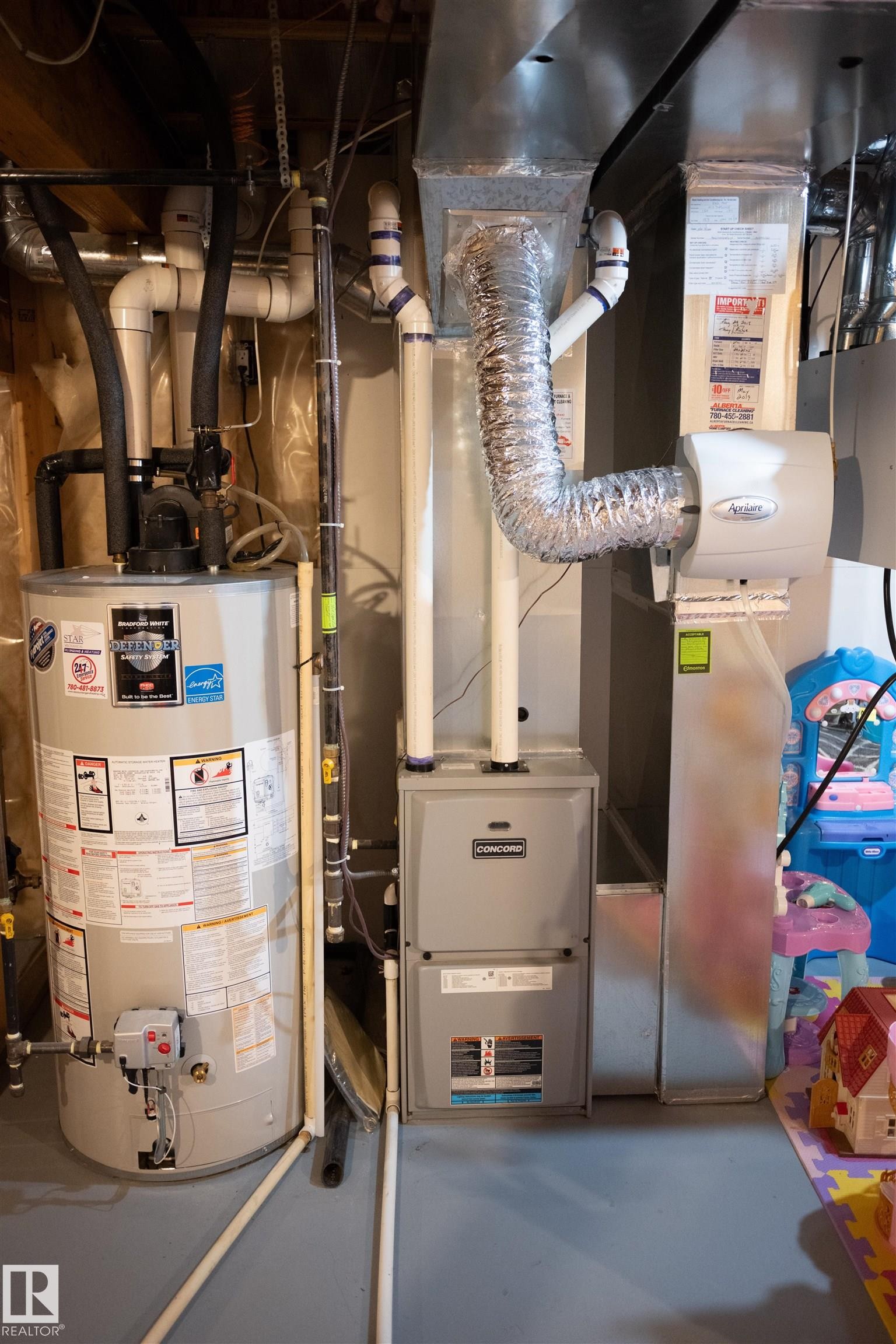 Water heater, furnace, and connected ductwork - 9014 Cooper Link Link Sw, Edmonton, AB