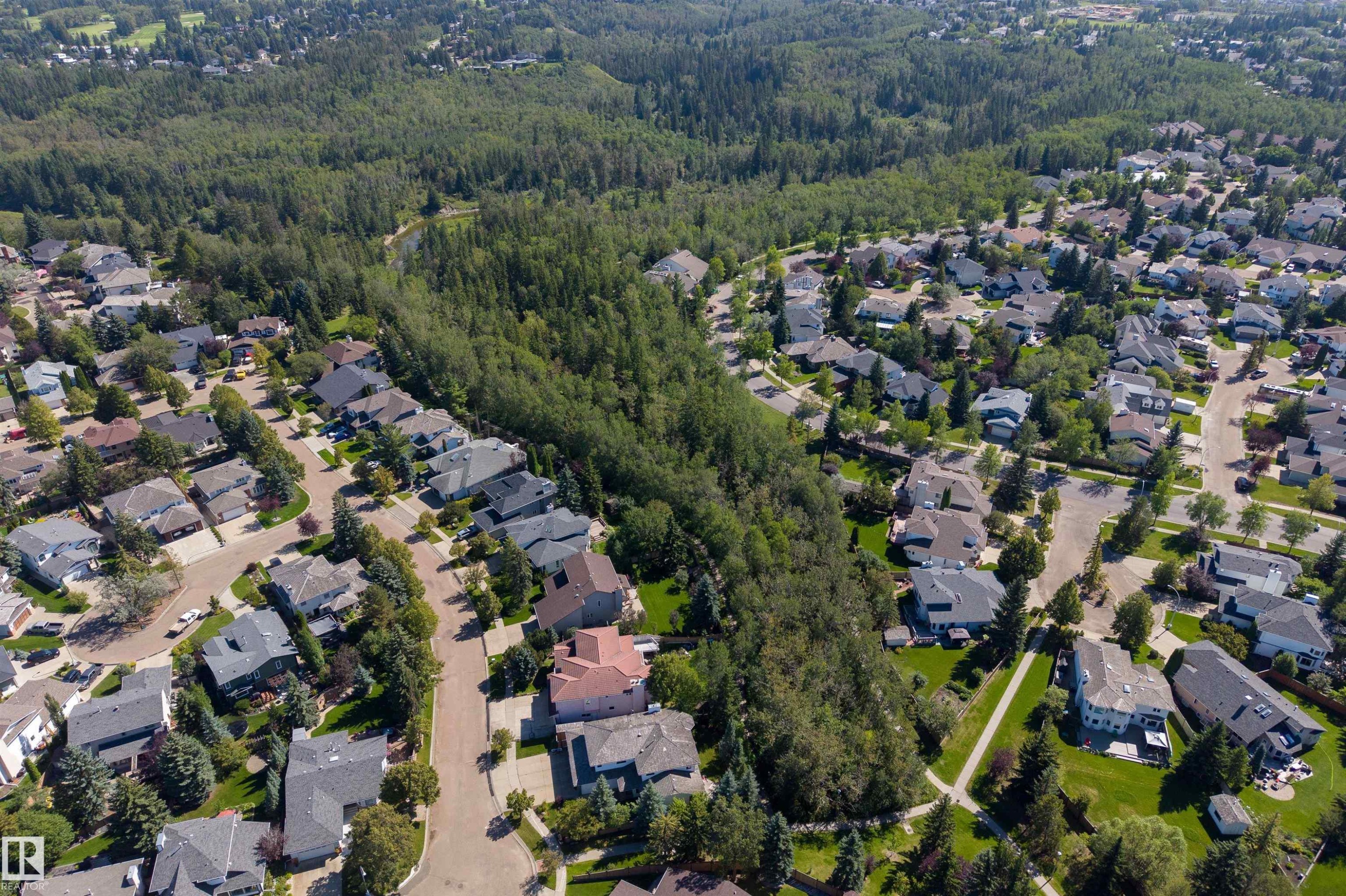 Residential development bordered by expansive natural tree coverage - #71 330 Bulyea Rd Nw, Edmonton, AB
