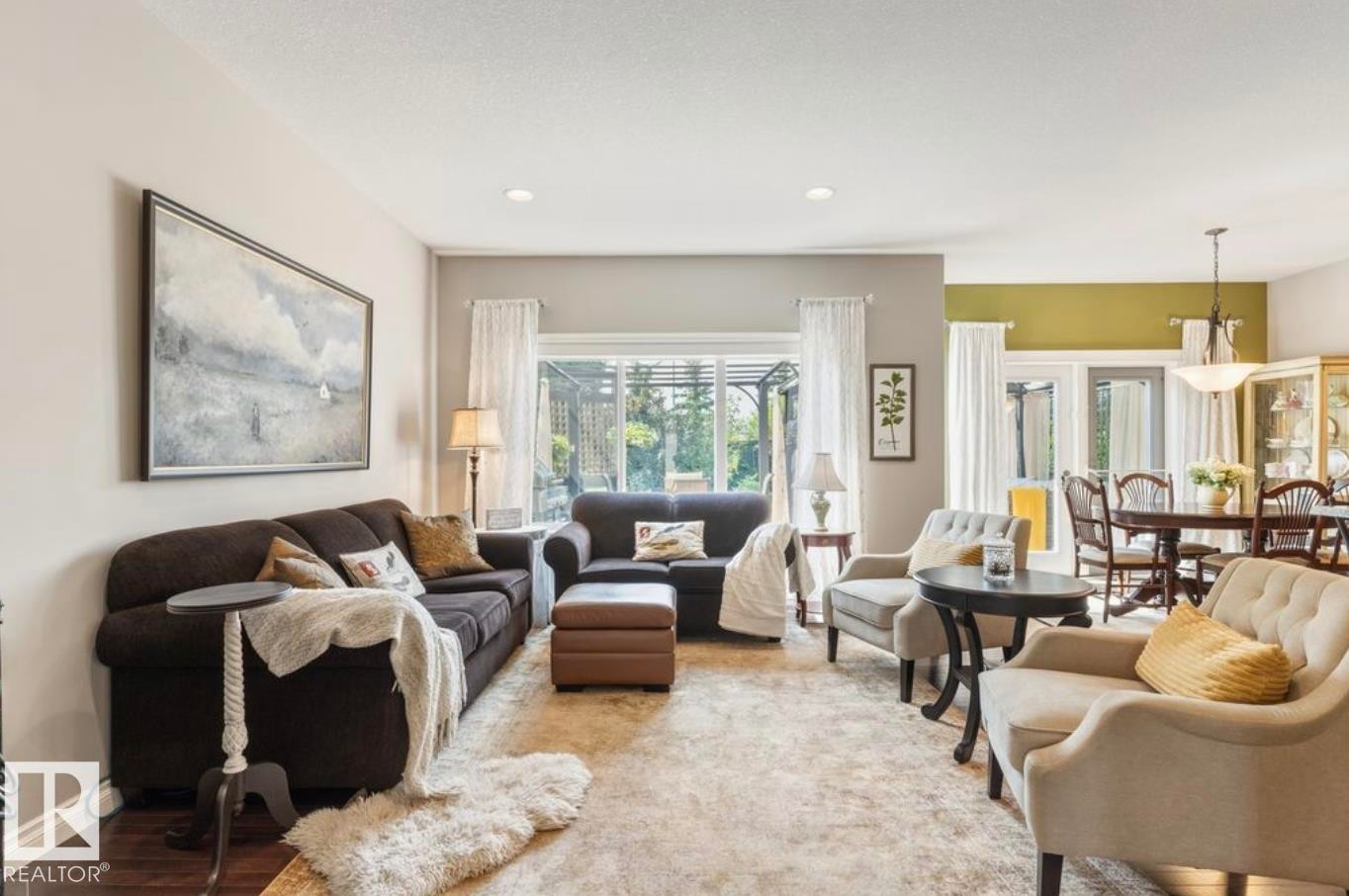 Recessed lighting, wood-finish flooring, and sliding glass doors - 22 Voleta Crest, Spruce Grove, AB