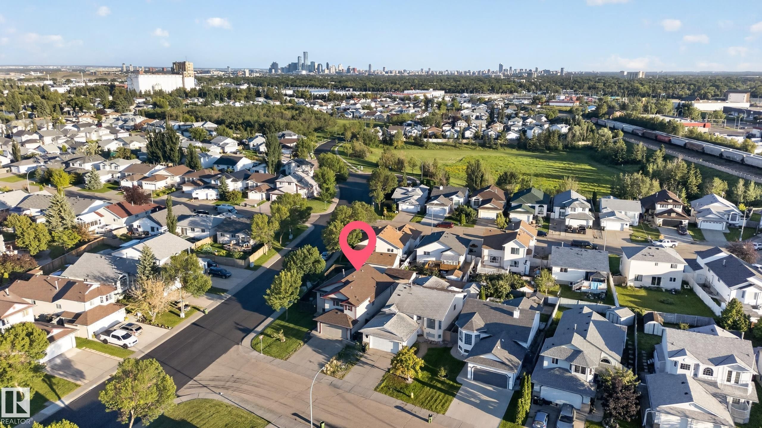 Residential neighborhood with varied architectural styles and mature trees - 13803 130A Avenue Nw, Edmonton, AB
