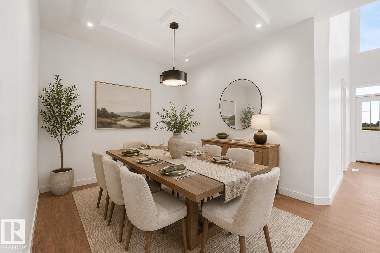Recessed ceiling lighting, wood-finish flooring, a contemporary pendant light fixture, a wood dining table, and a wood buffet cabinet - 511 157 Avenue Ne, Edmonton, AB