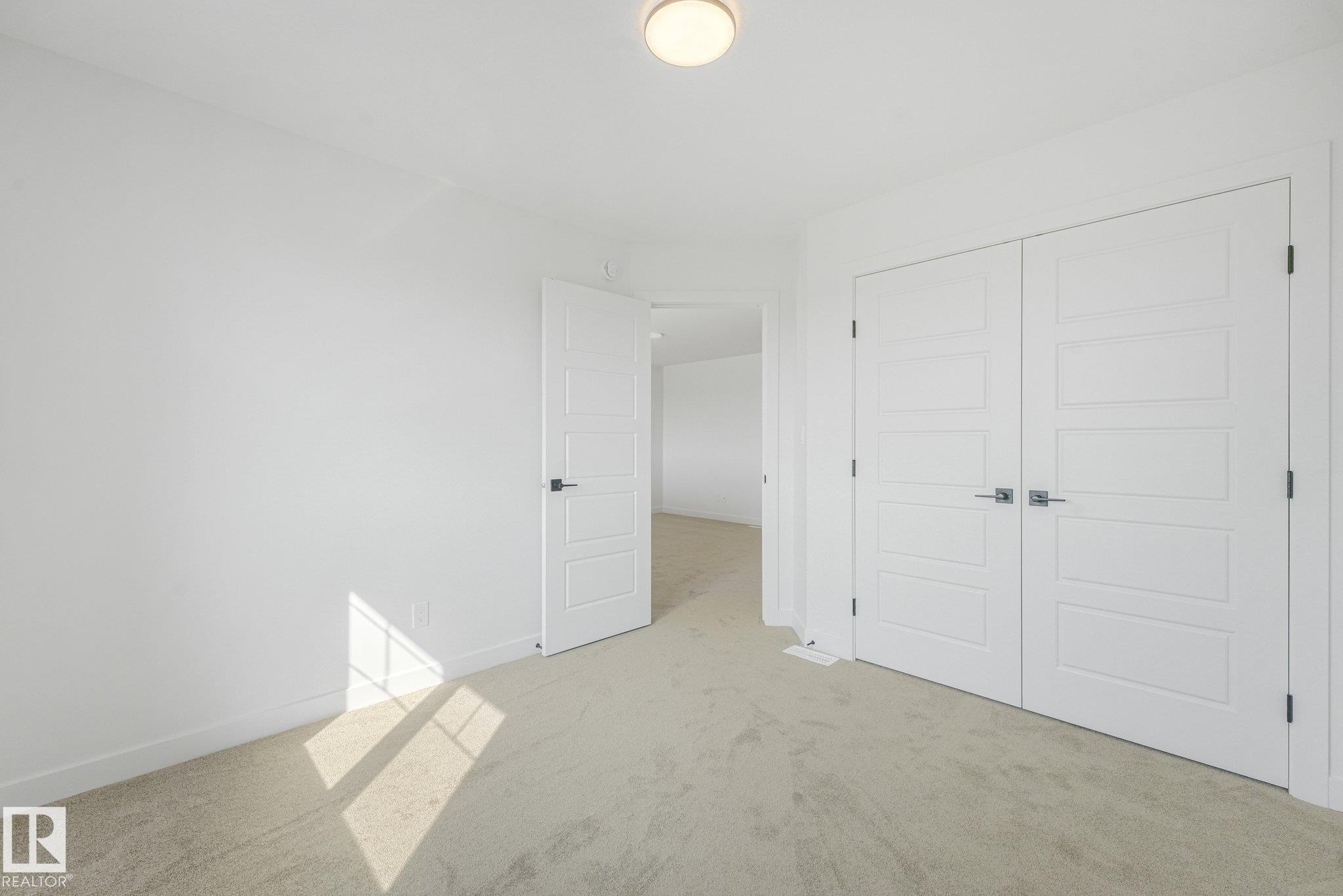 Neutral tone carpeting - 511 157 Avenue Ne, Edmonton, AB