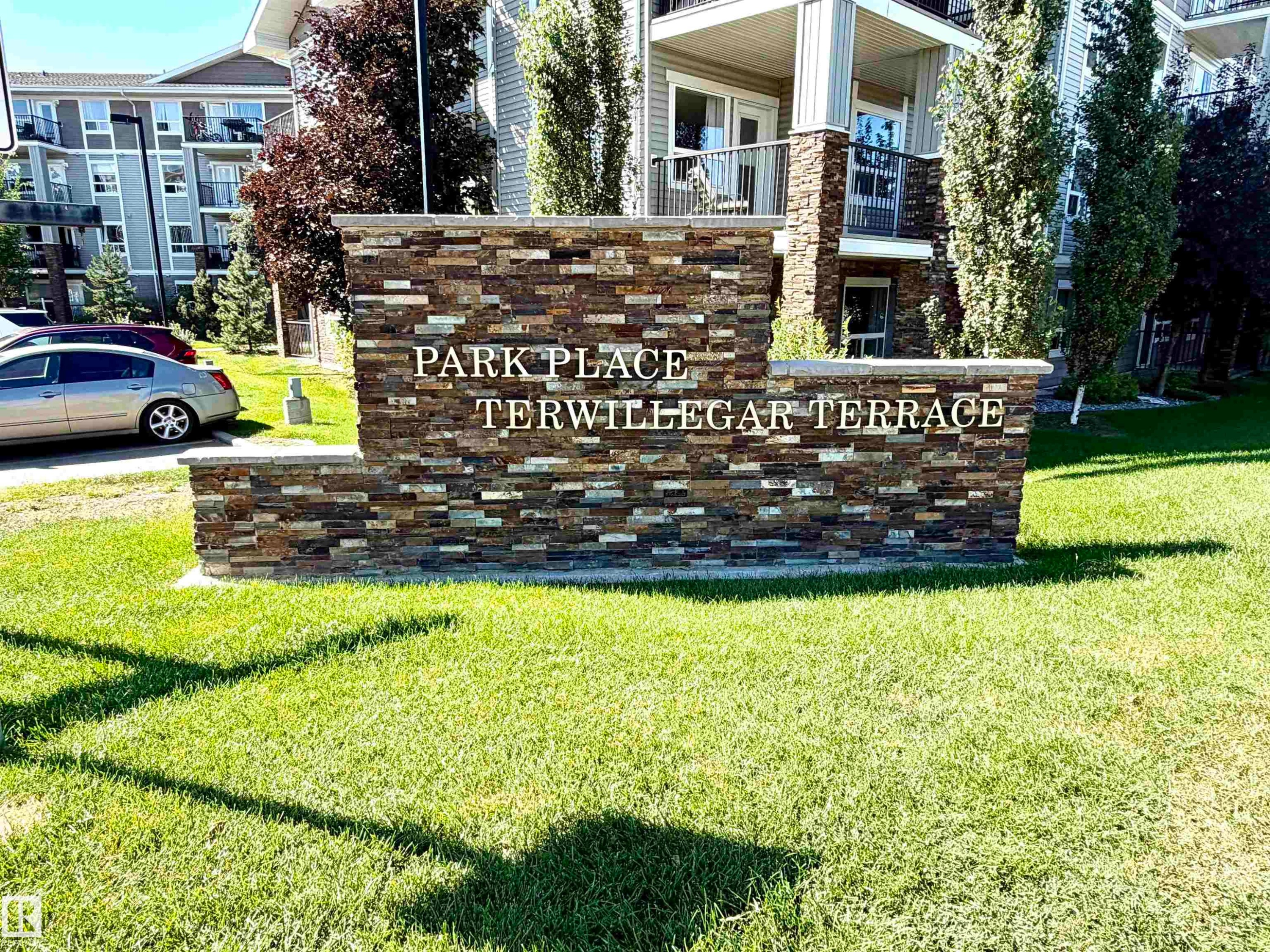 Stacked stone monument with raised lettering - #1304 9363 Simpson Dr Nw, Edmonton, AB