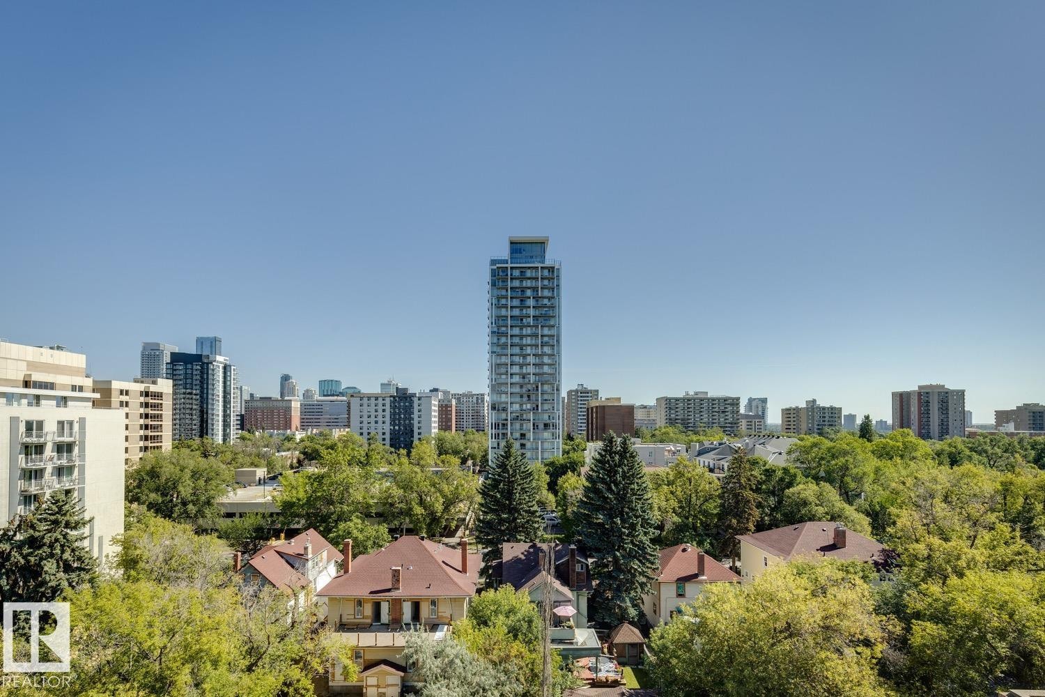 Cityscape panorama with a high-rise building and surrounding urban structures - #905 9929 113 St Nw, Edmonton, AB