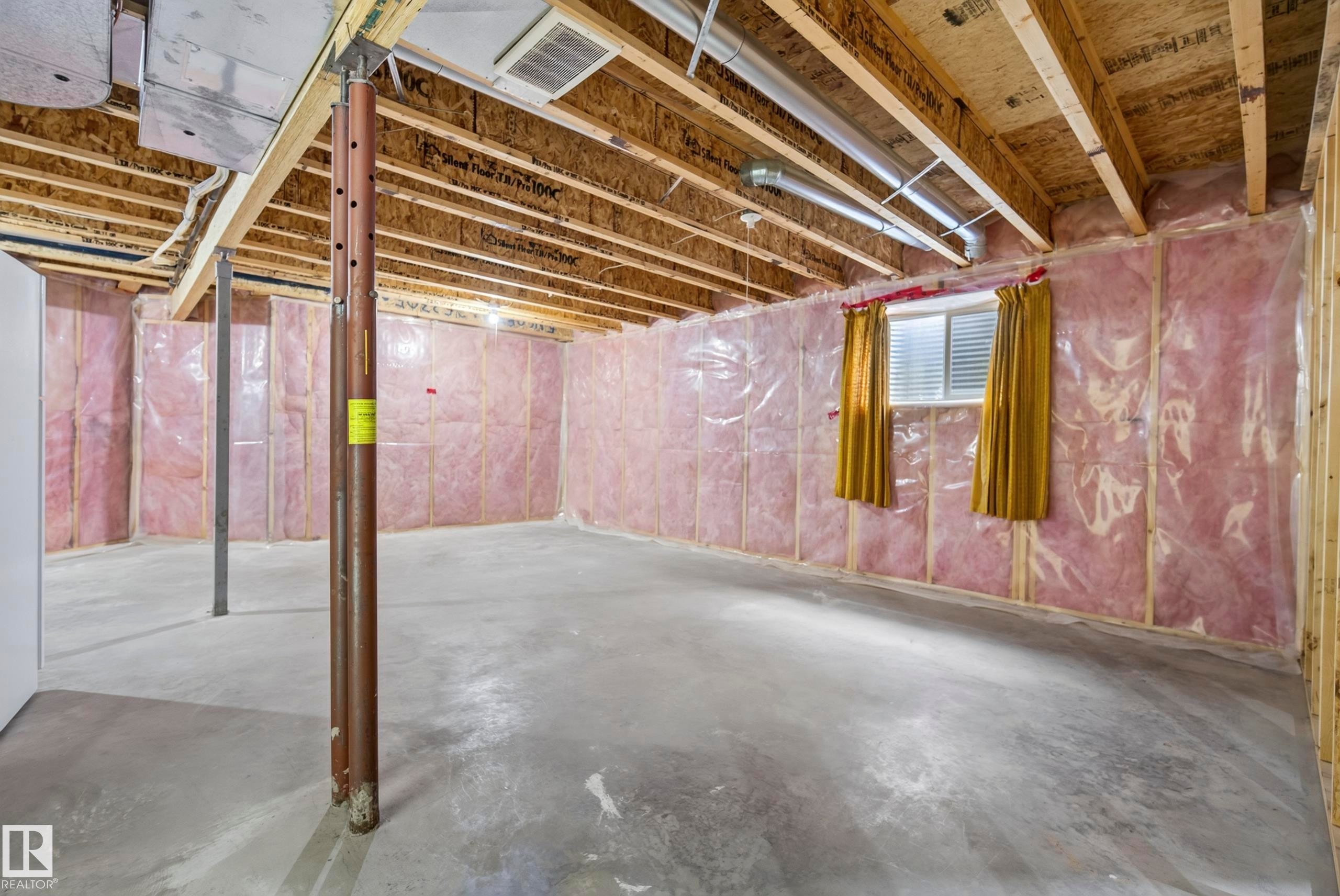 Unfinished basement with concrete flooring - 15213 49A Street Nw, Edmonton, AB