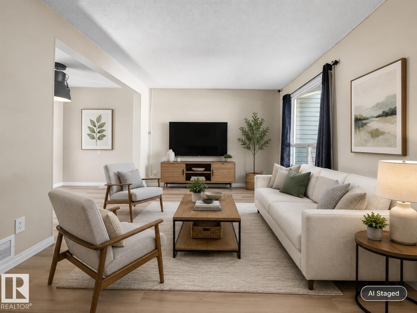 Wood-finish flooring throughout, neutral paint palette, and an open doorway - 141 Dickinsfield Court Nw, Edmonton, AB