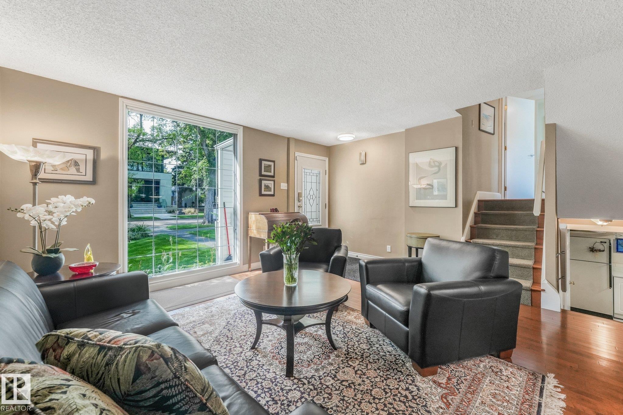 Expansive floor to ceiling window overlooking the front yard. - 10531 137 Street Nw, Edmonton, AB