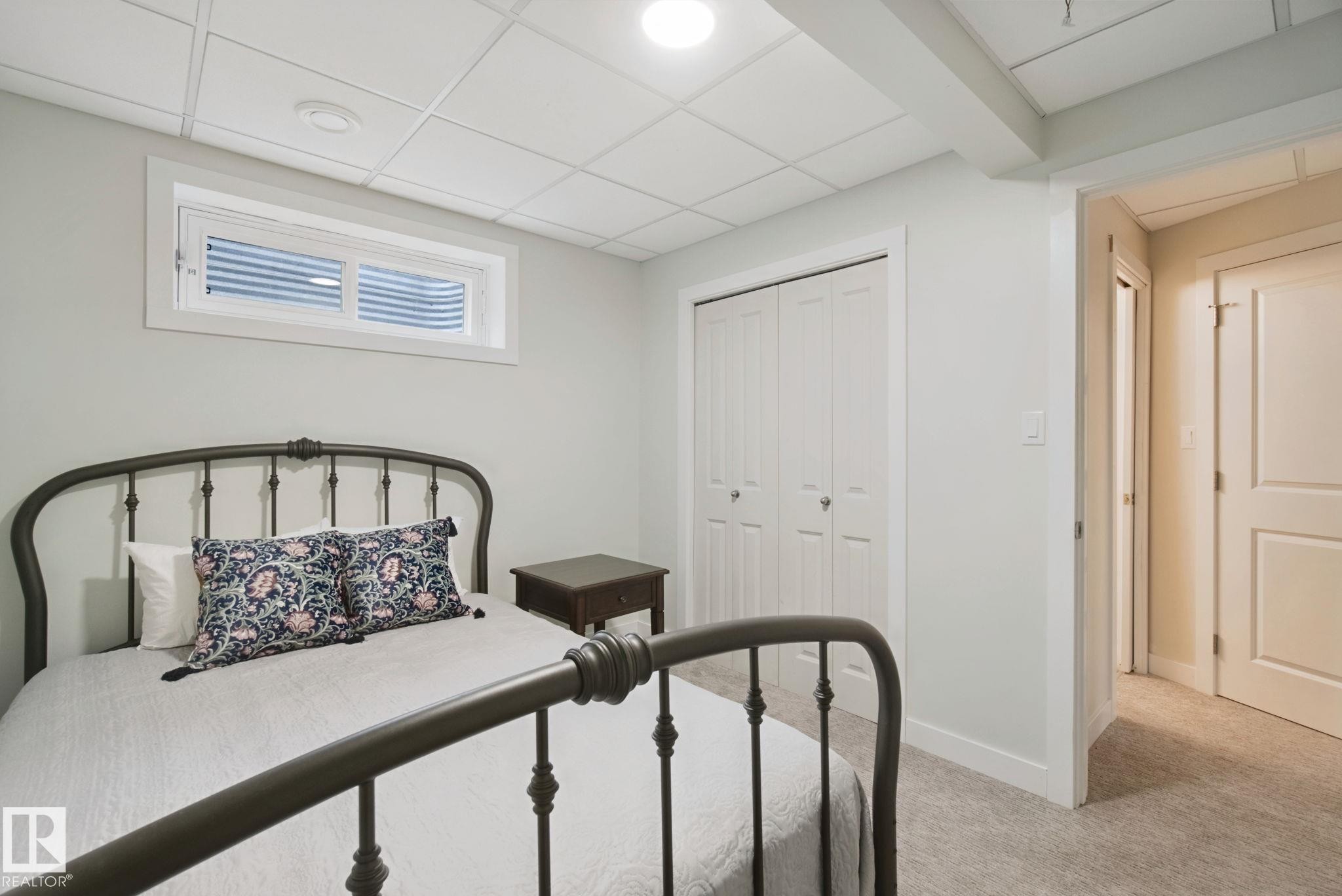 Recessed lighting, wall-to-wall carpeting, and a bi-fold closet - 15618 141 Street Nw, Edmonton, AB