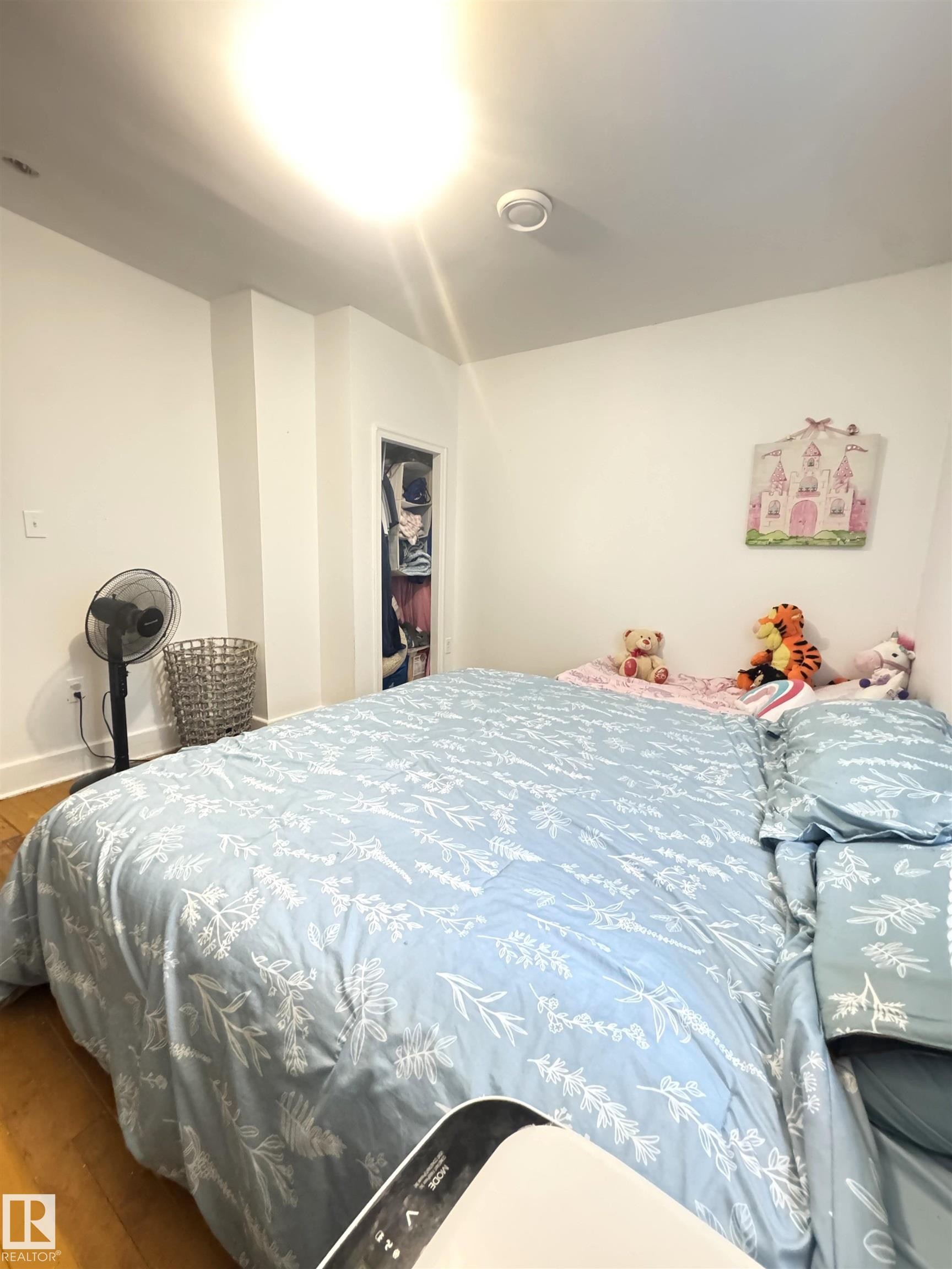 Bedroom featuring wood-finish flooring, recessed lighting, and white baseboards - 5019 48 Avenue, Onoway, AB - Indoor Photo Showing Bedroom