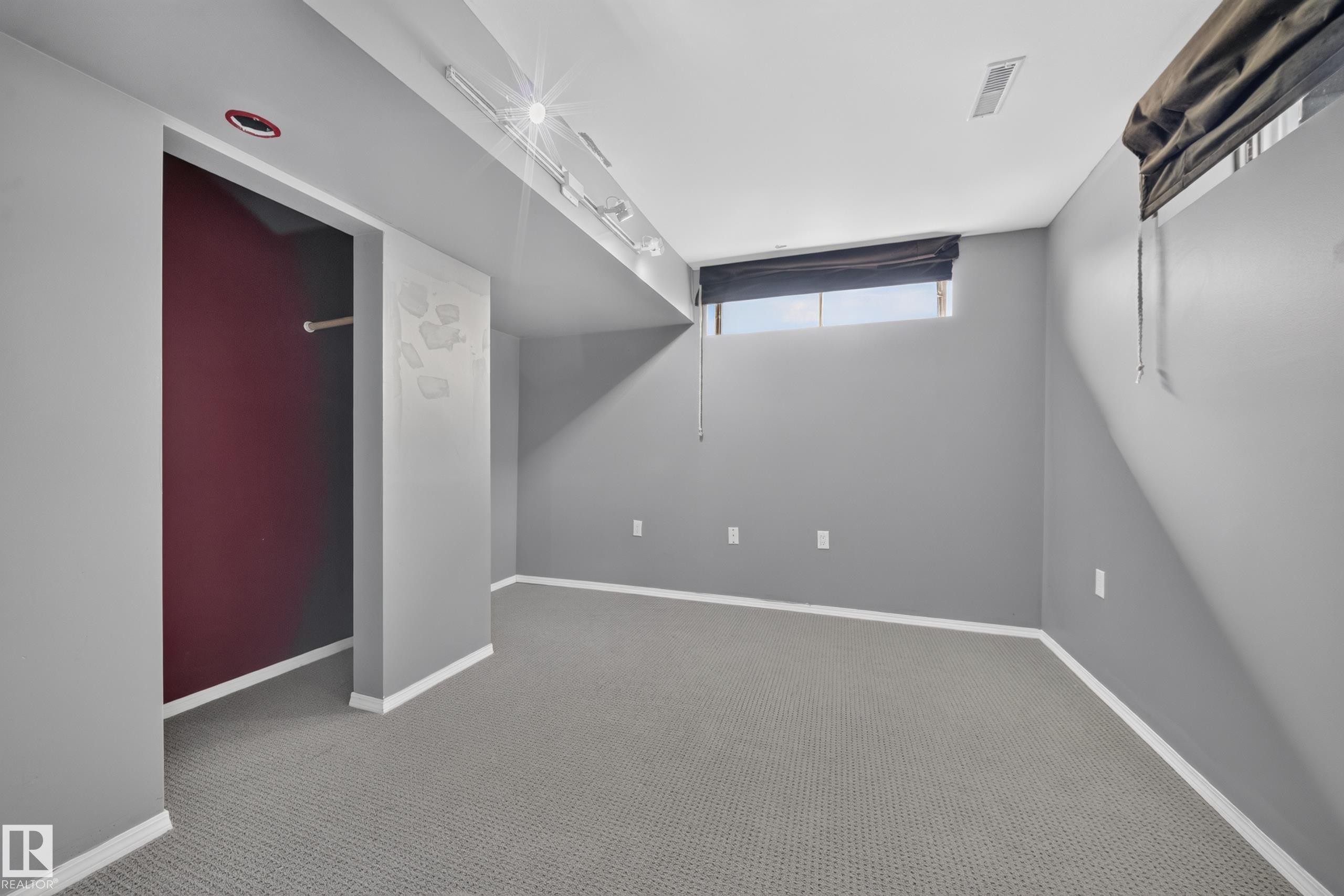 Carpeted flooring, recessed lighting, track lighting, and a window with blinds - 155 Marlborough Place Nw, Edmonton, AB