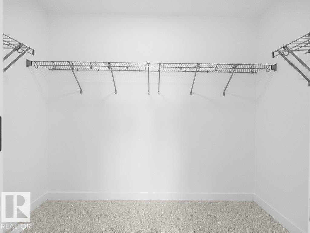 Wall-to-wall carpeting and built-in wire shelving - 912 17 Ave Nw, Edmonton, AB