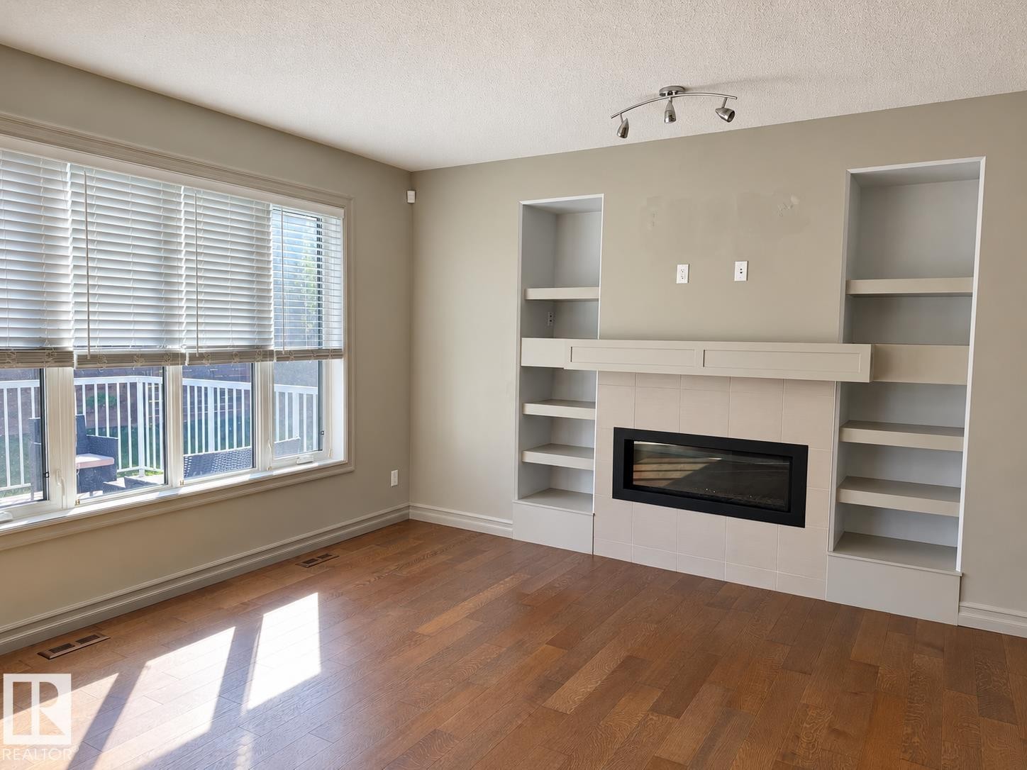 Hardwood-style flooring throughout - 885 Windermere Wynd Nw, Edmonton, AB