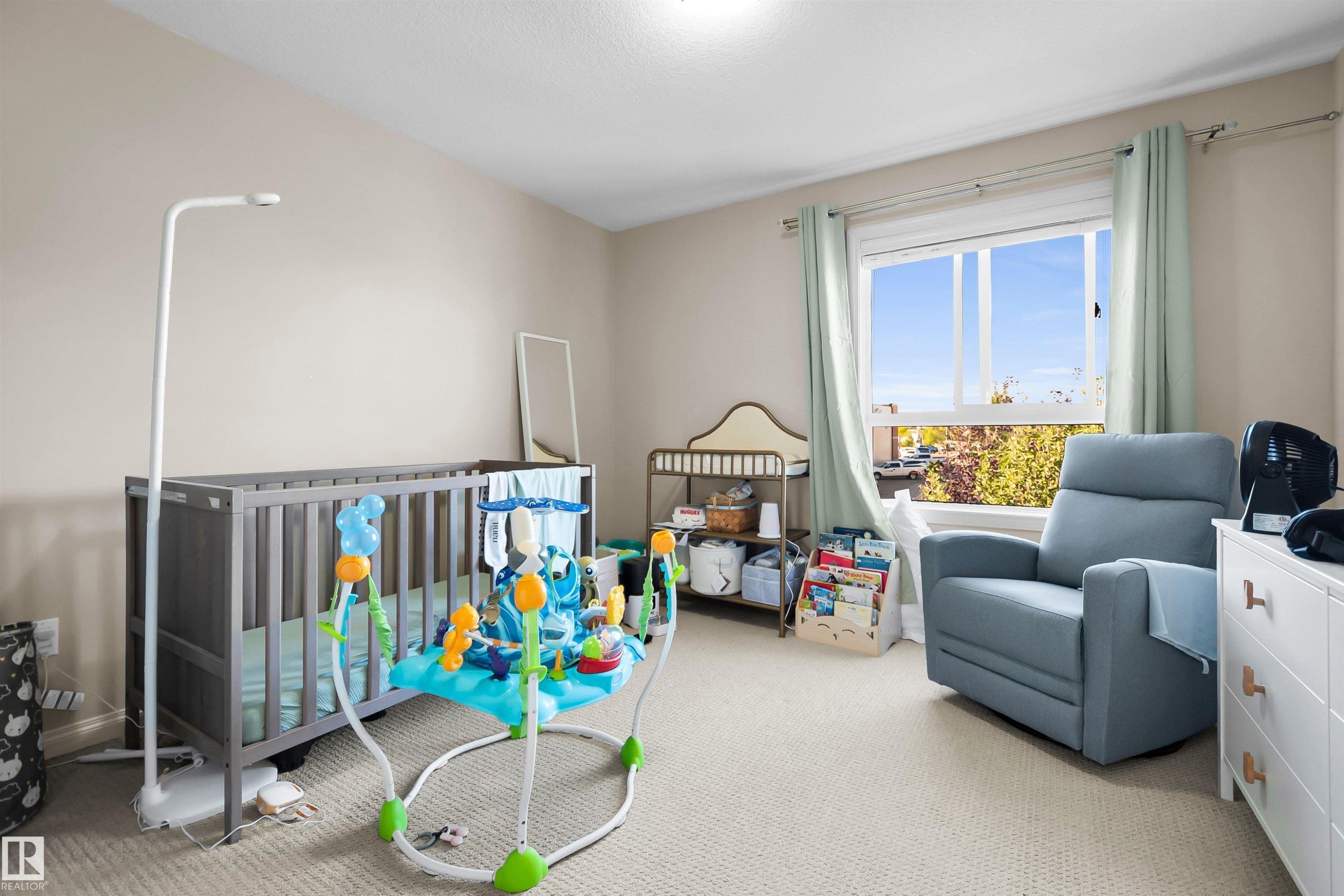 Neutral-toned wall paint and light-colored carpeting - #5 5120 164 Av Nw, Edmonton, AB
