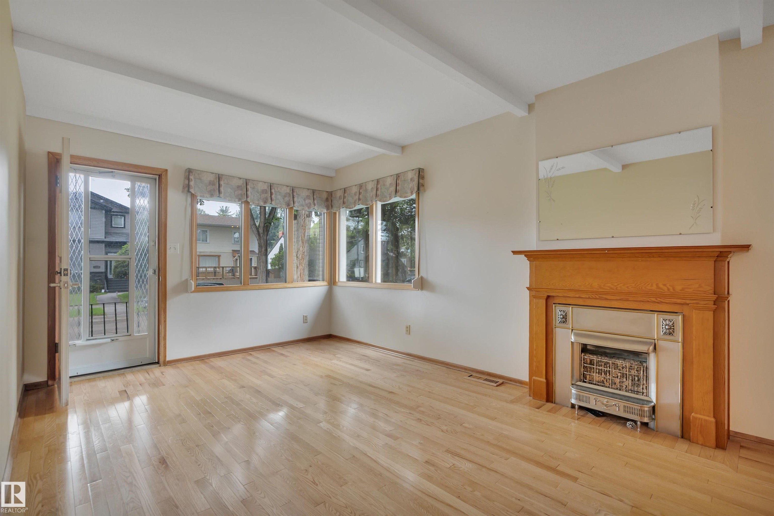 11527 88 Street Nw, Edmonton, AB - Indoor Photo Showing Living Room With Fireplace
