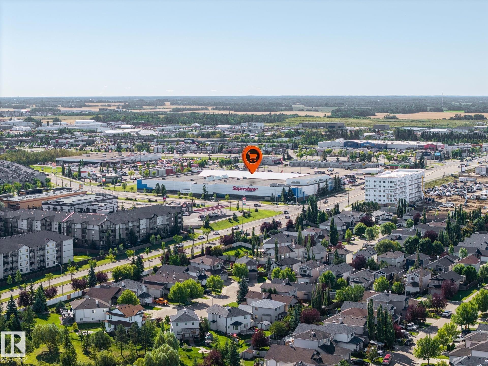 Established suburban neighborhood with diverse residential structures, abundant green spaces, and commercial amenities - #122 240 Spruce Ridge Rd, Spruce Grove, AB