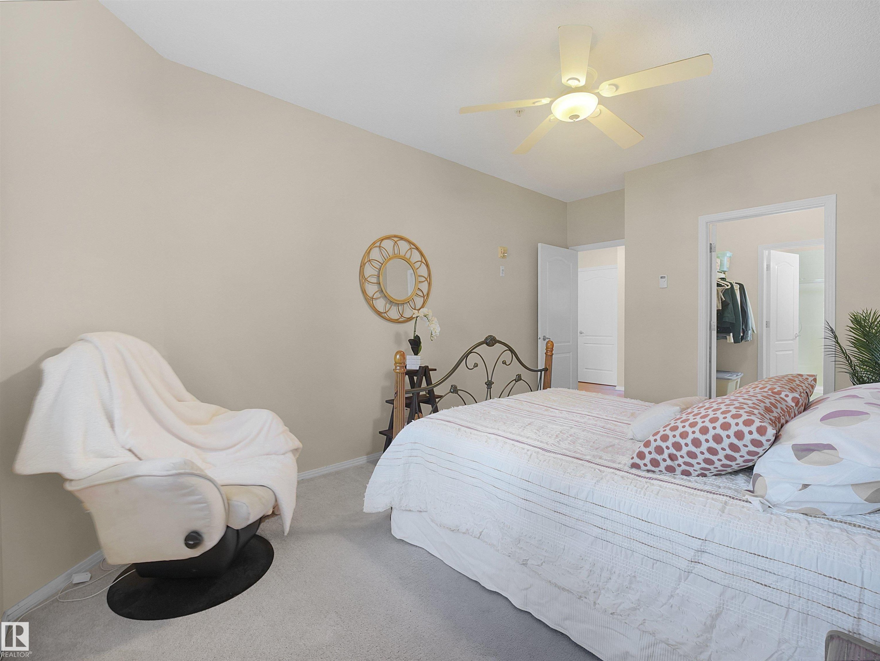 Recessed lighting, ceiling fan, and light-toned wall paint - #206 12111 51 Av Nw, Edmonton, AB