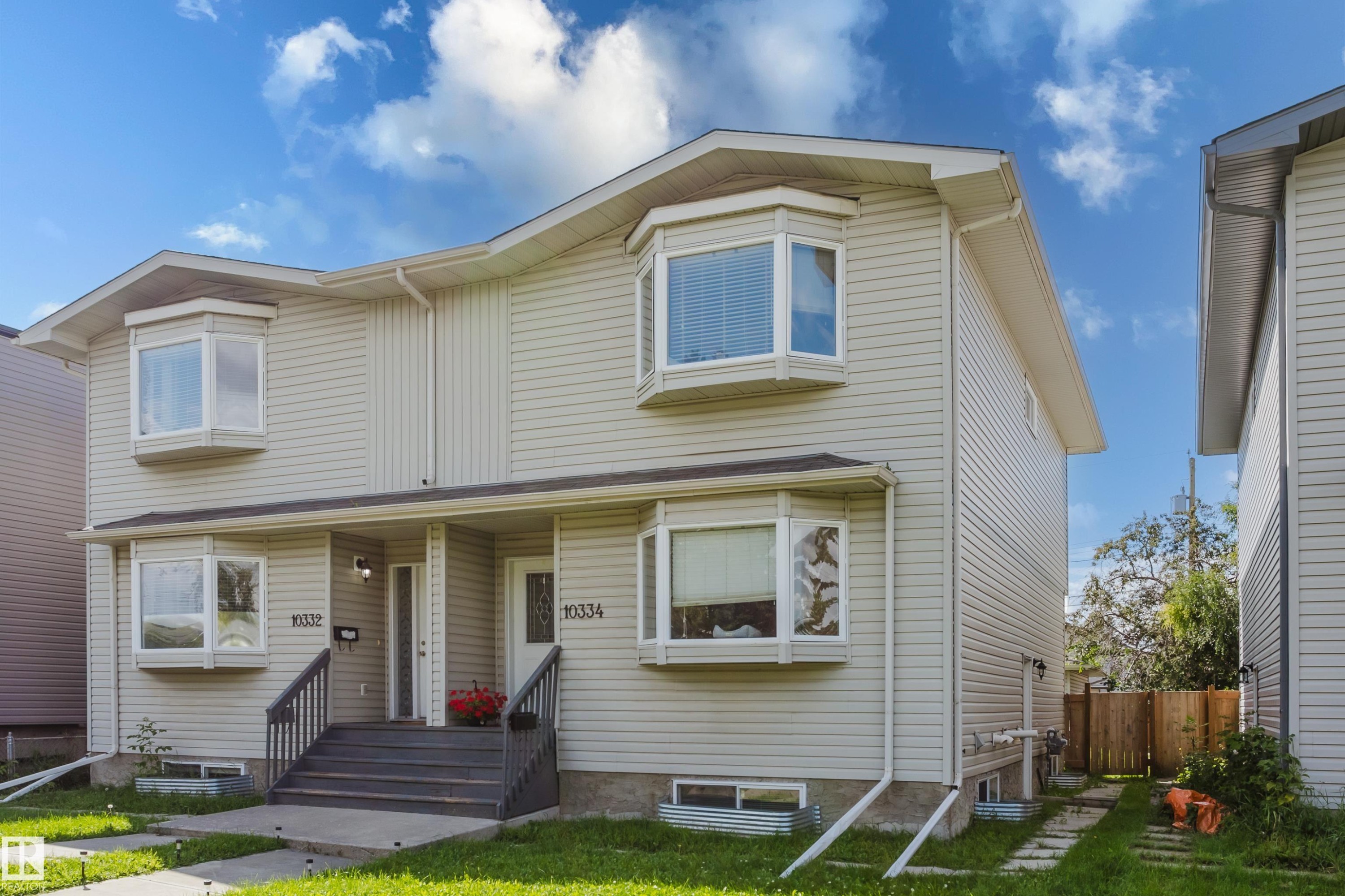 Double-fronted exterior with light-colored siding - 10334 161 Street Nw, Edmonton, AB