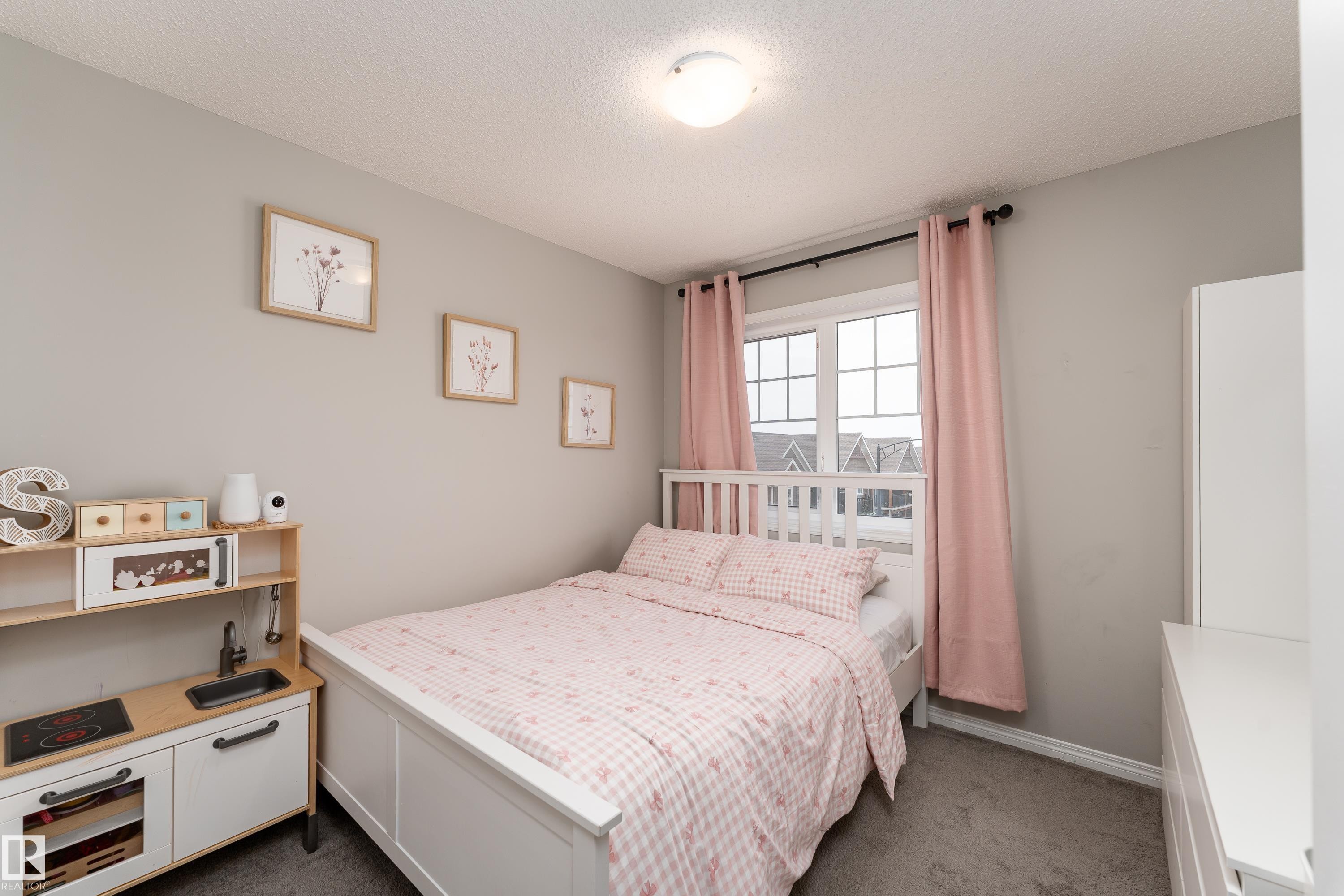 Wall-to-wall carpeting and neutral wall paint - 20247 16 Avenue Nw, Edmonton, AB