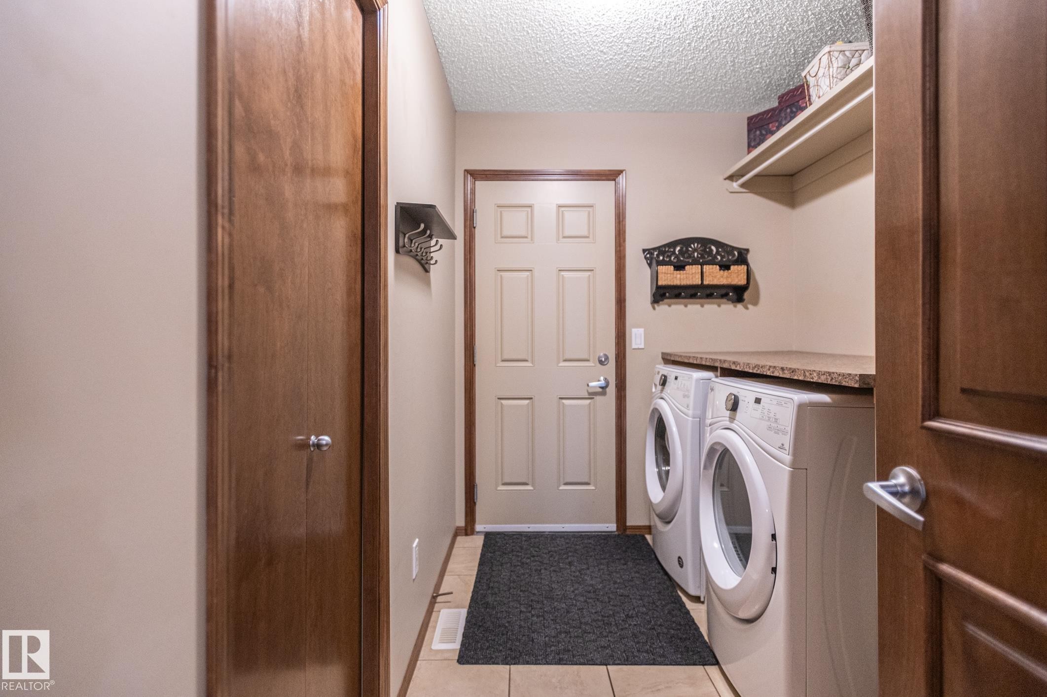 Laundry room - 19 Newton Place, St. Albert, AB