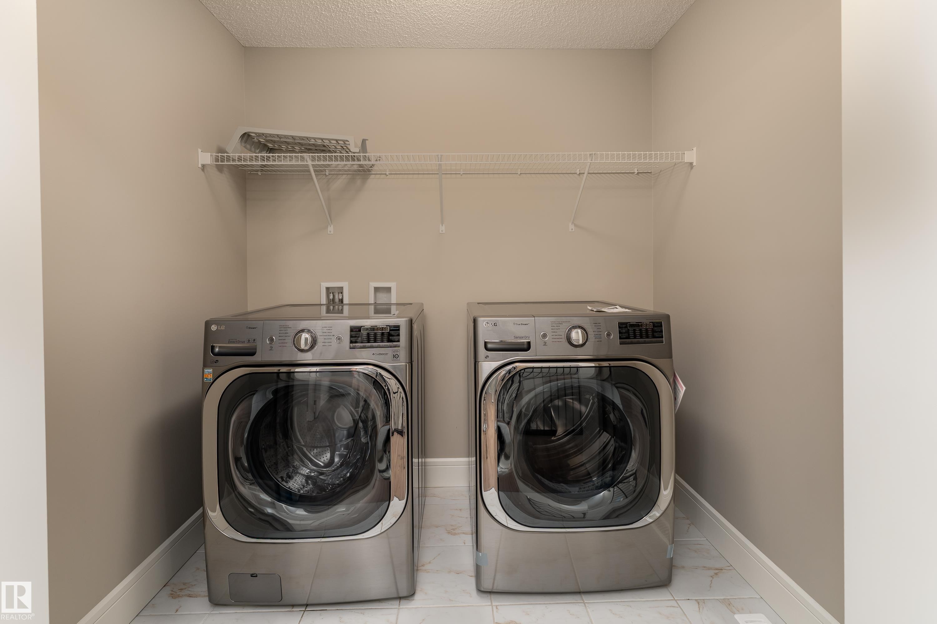 3301 Abbott Crescent Sw, Edmonton, AB - Indoor Photo Showing Laundry Room