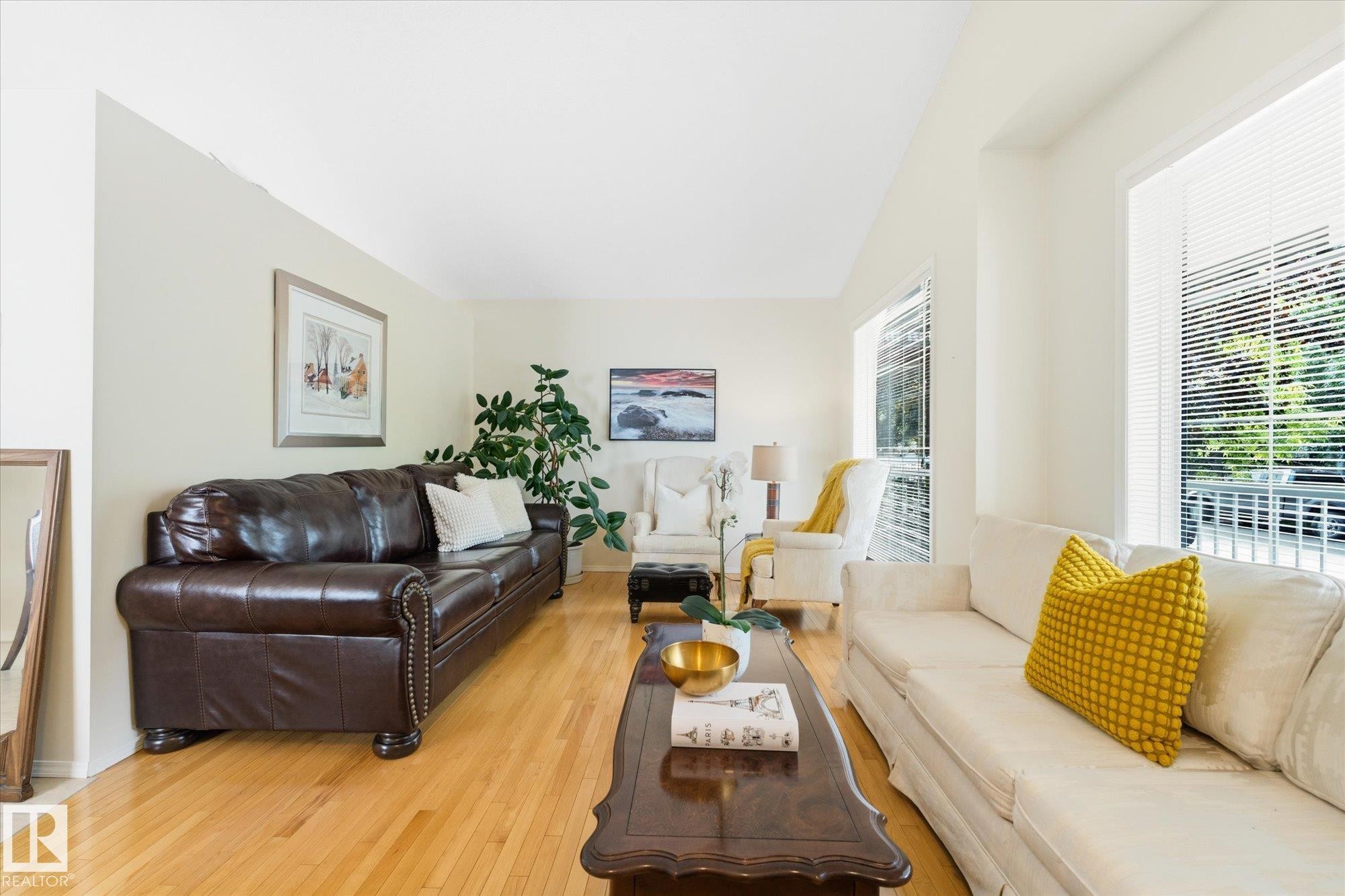 Hardwood flooring, light neutral wall color, recessed lighting, and multiple windows with blinds - 1709 Turvey Bend Bend Nw, Edmonton, AB