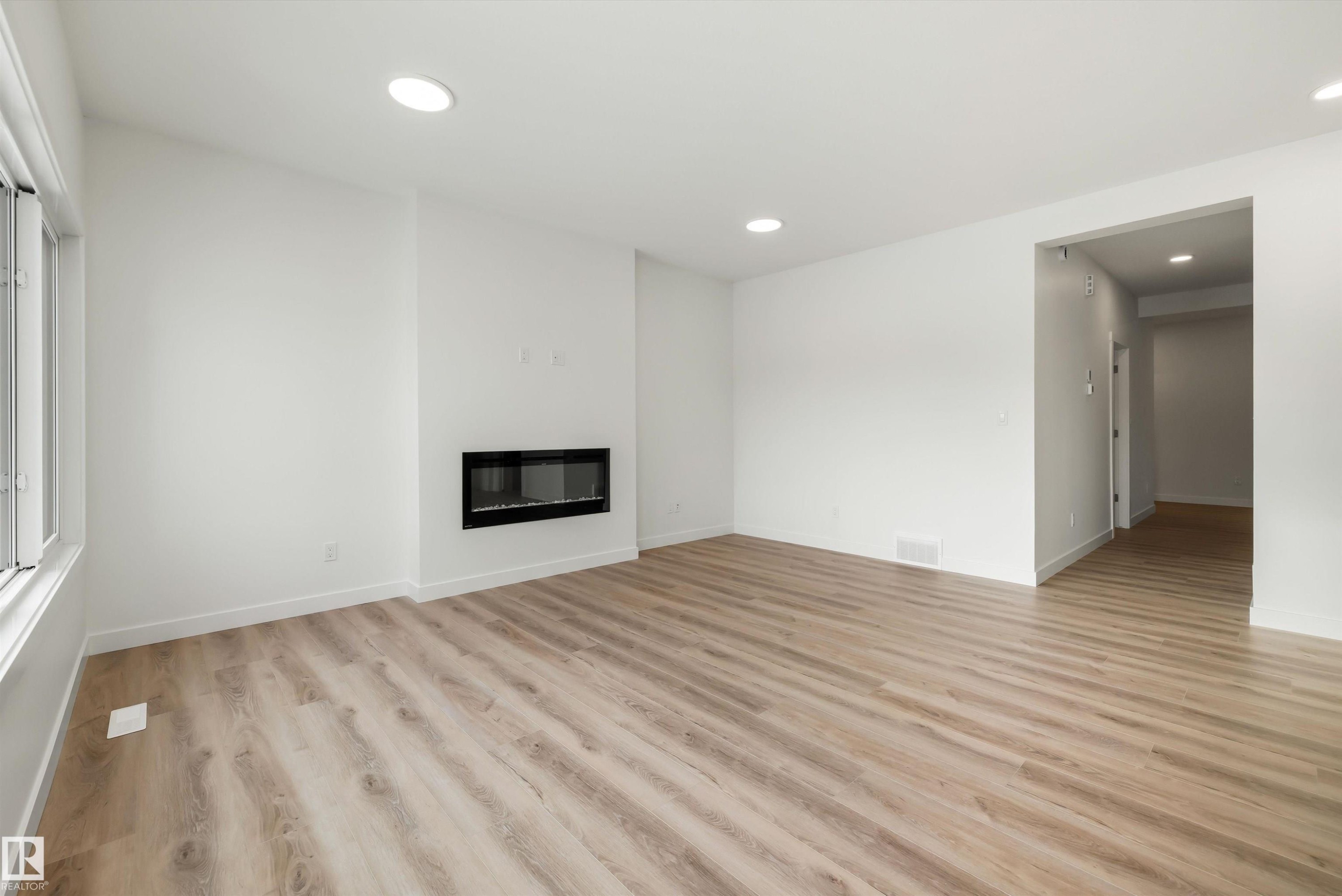 1315 11 Avenue Nw, Edmonton, AB - Indoor Photo Showing Living Room With Fireplace