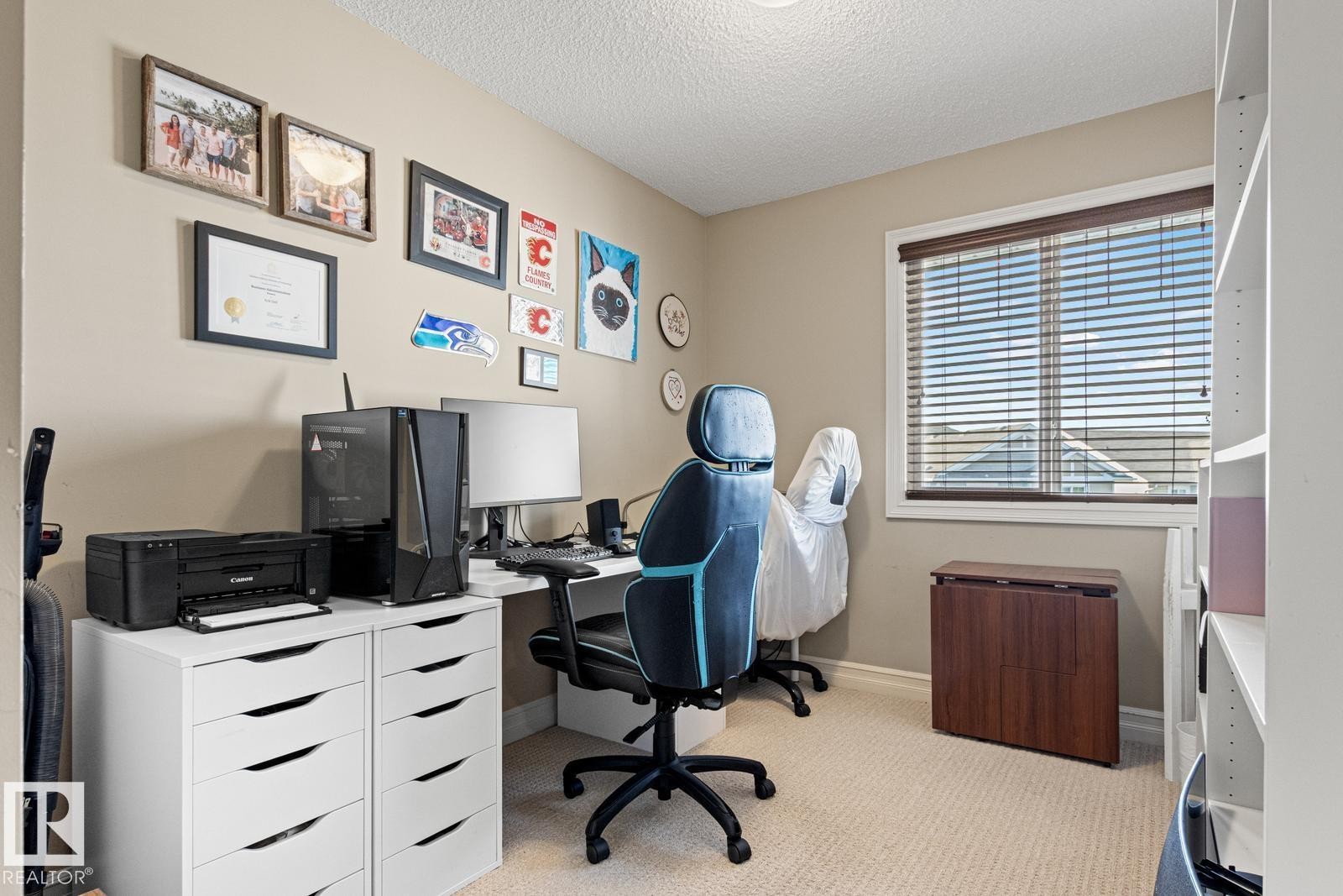 Neutral-toned walls complement the window with horizontal blinds - 5319 3 Avenue Sw, Edmonton, AB