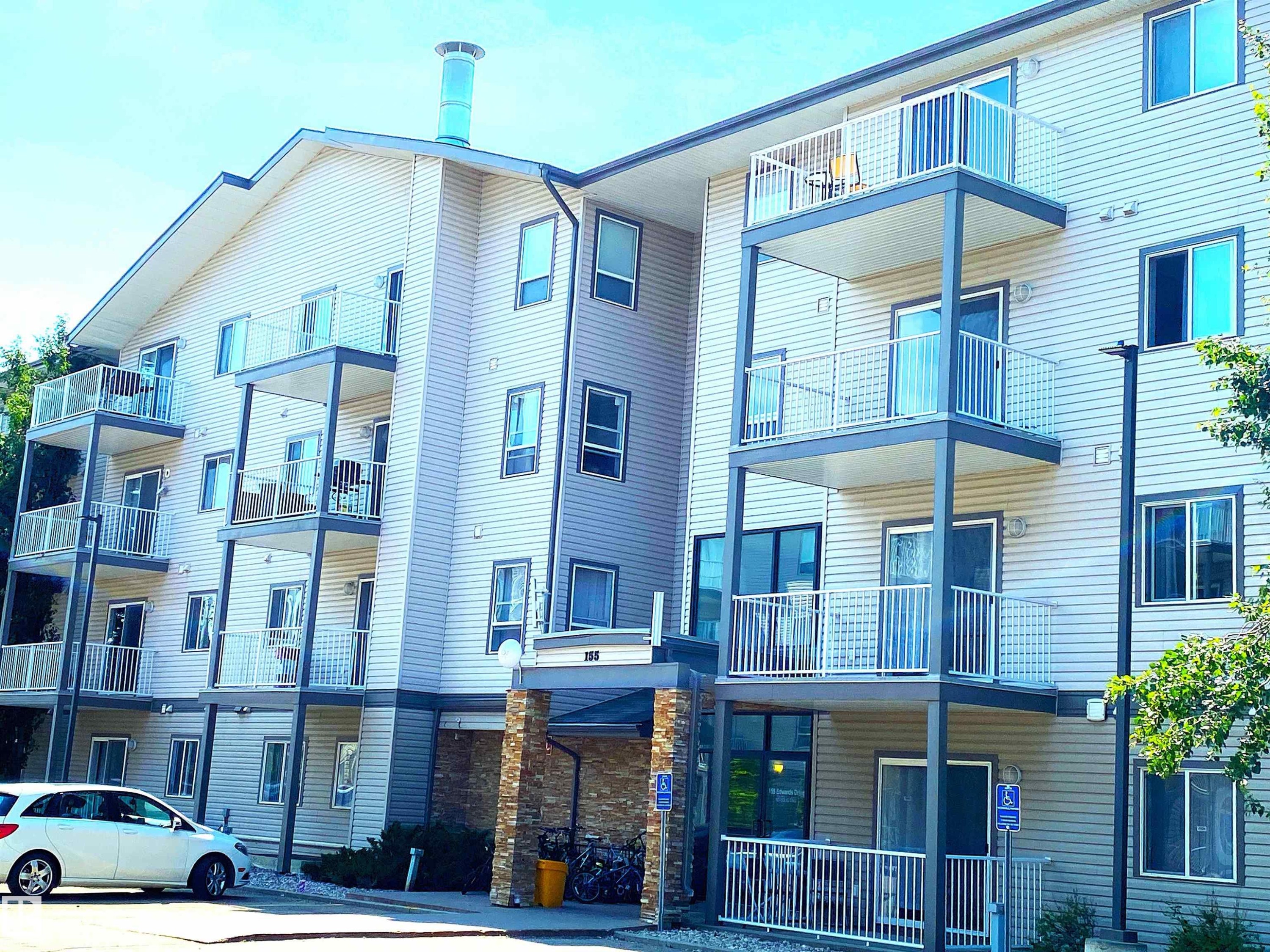 #105 155 Edwards Dr Sw, Edmonton, AB - Outdoor With Balcony With Facade