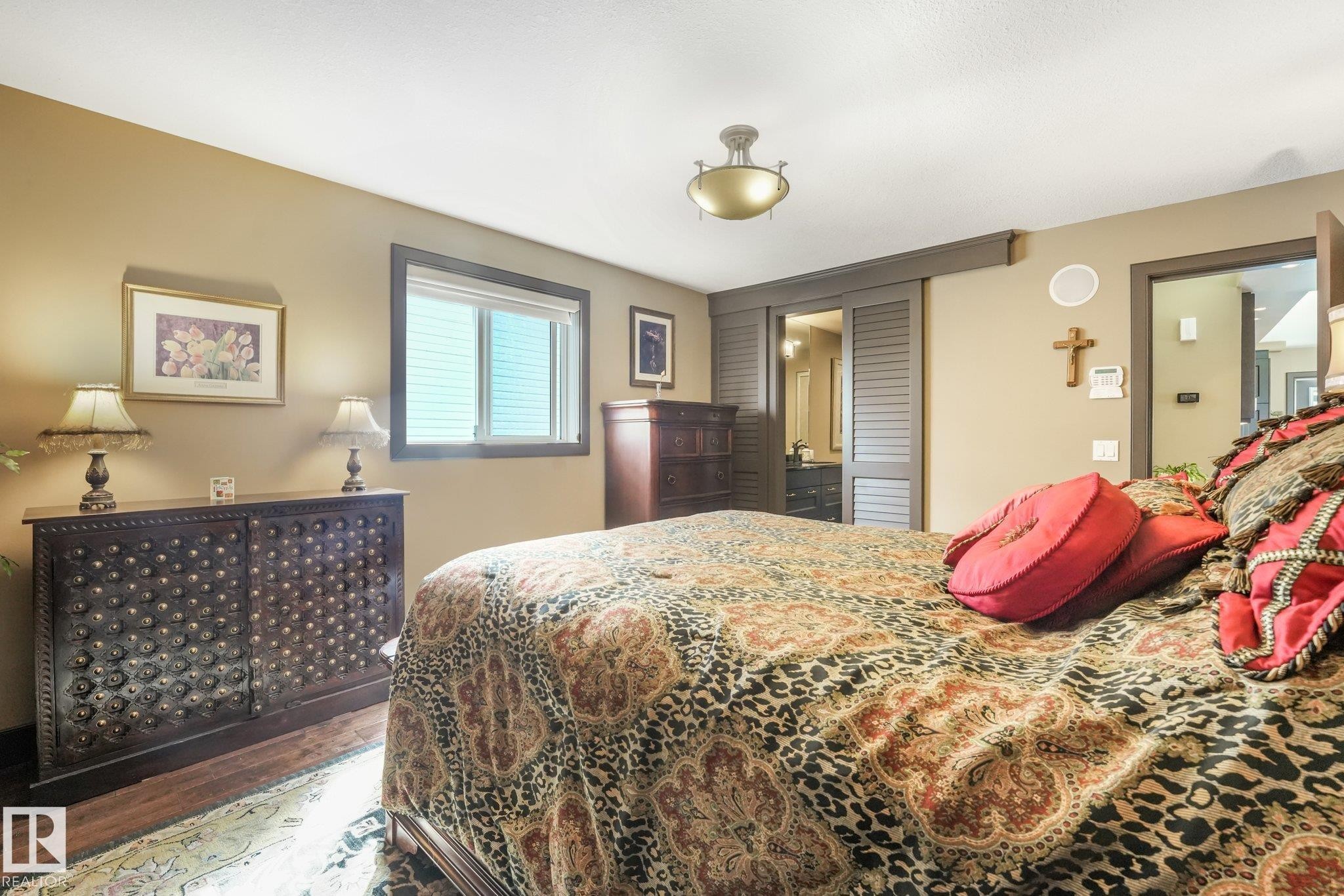 Wood-finish flooring, interior window, and recessed lighting - 12827 150 Avenue Nw, Edmonton, AB