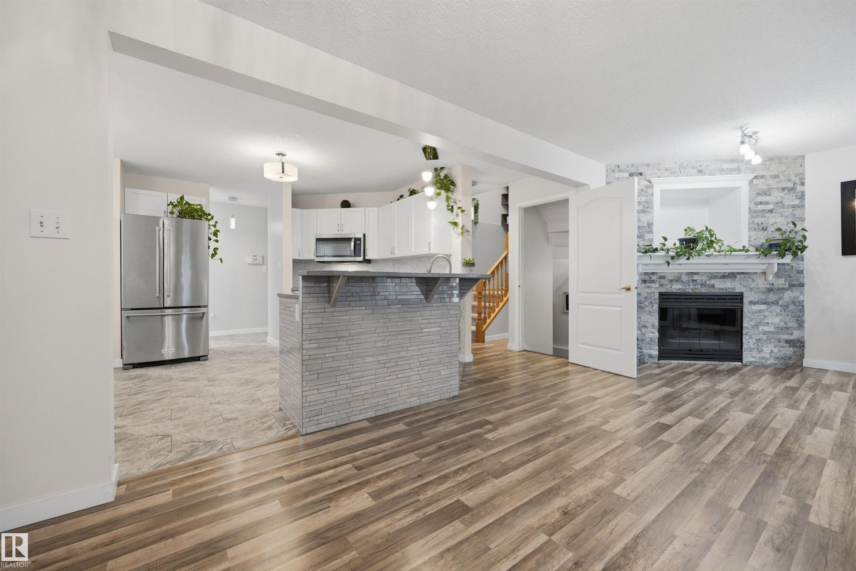 View from the dinette of the open-concept main floor plan - 6910 158A Avenue Nw, Edmonton, AB
