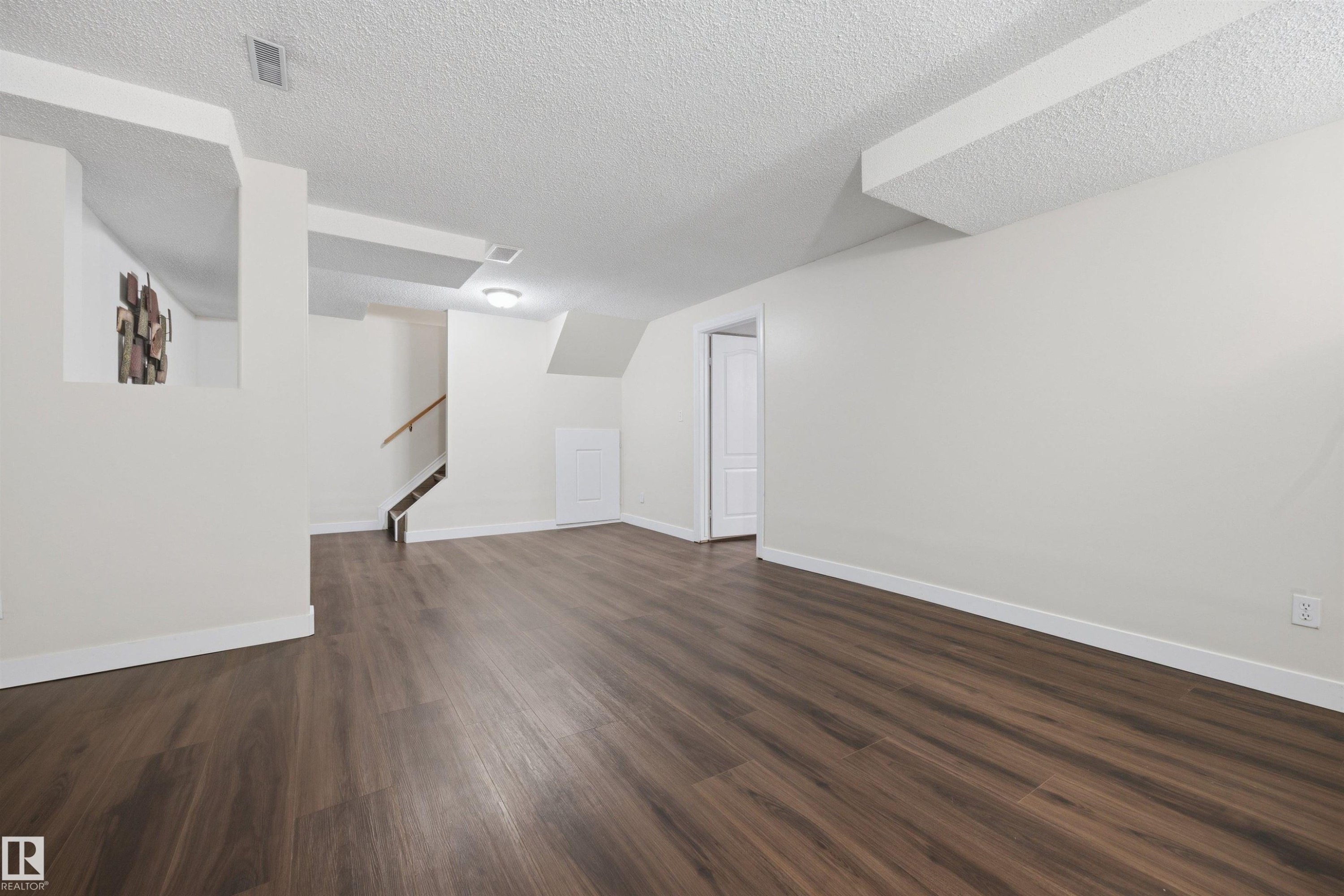 Large fully finished basement recreation room - 6910 158A Avenue Nw, Edmonton, AB