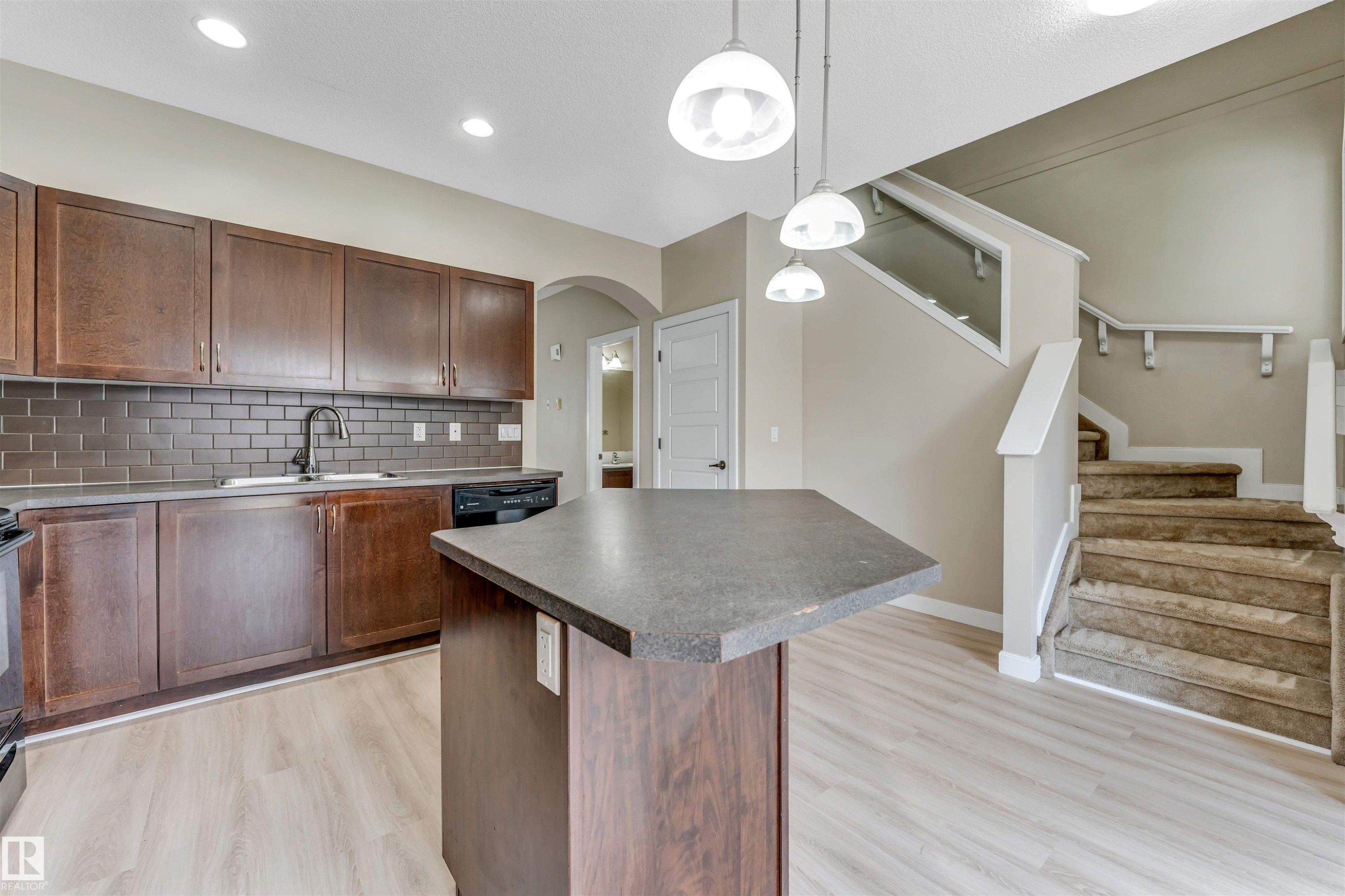 #27 13825 155 Av Nw, Edmonton, AB - Indoor Photo Showing Kitchen With Double Sink
