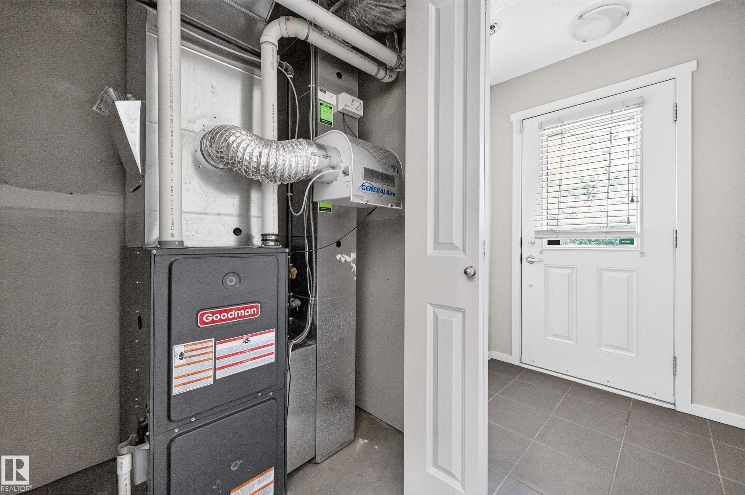 Utility area with a Goodman furnace and humidifier - #72 603 Watt Bv Sw Sw, Edmonton, AB