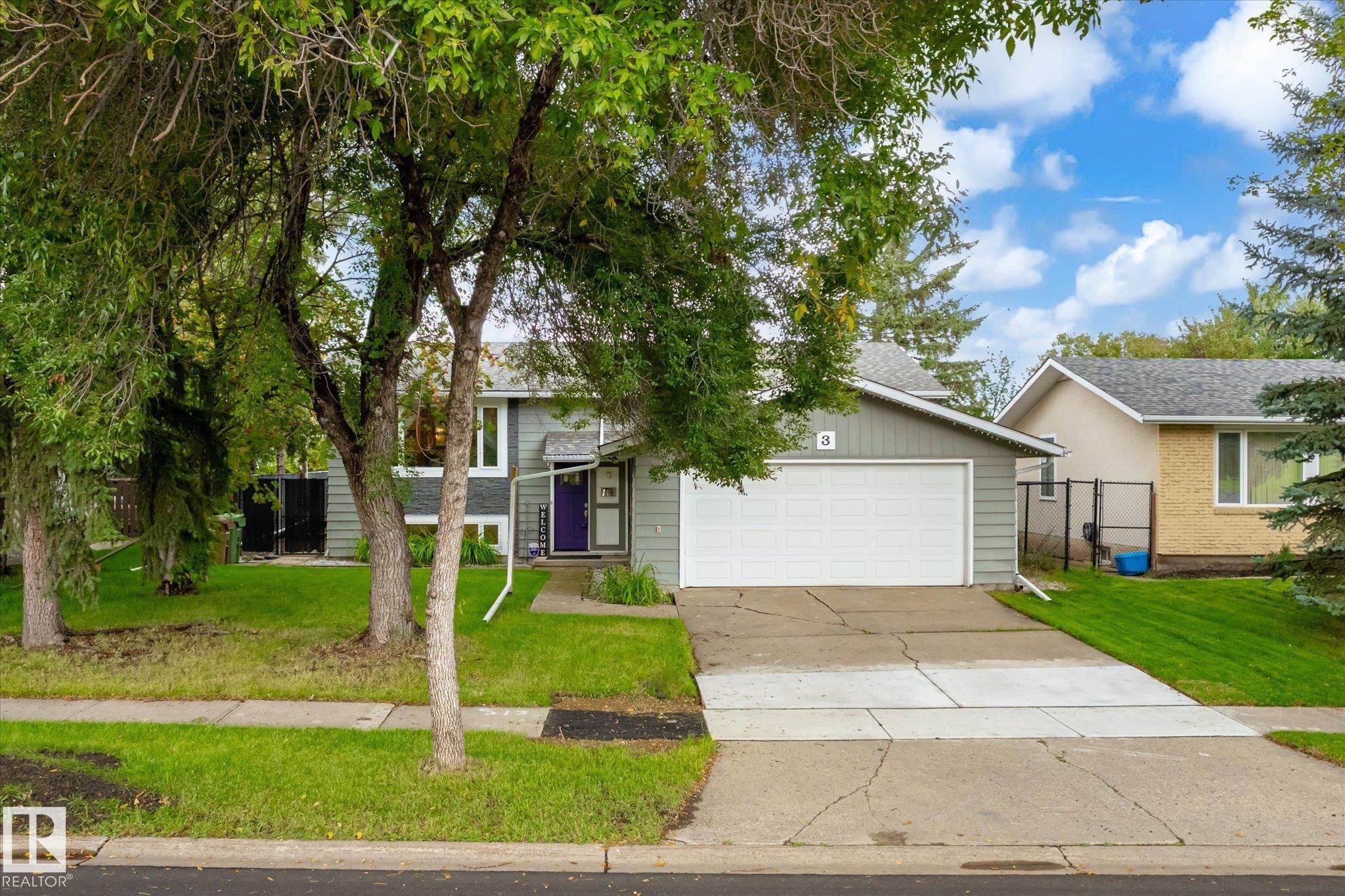 Attached garage with white door - 3 Akins Drive, St. Albert, AB