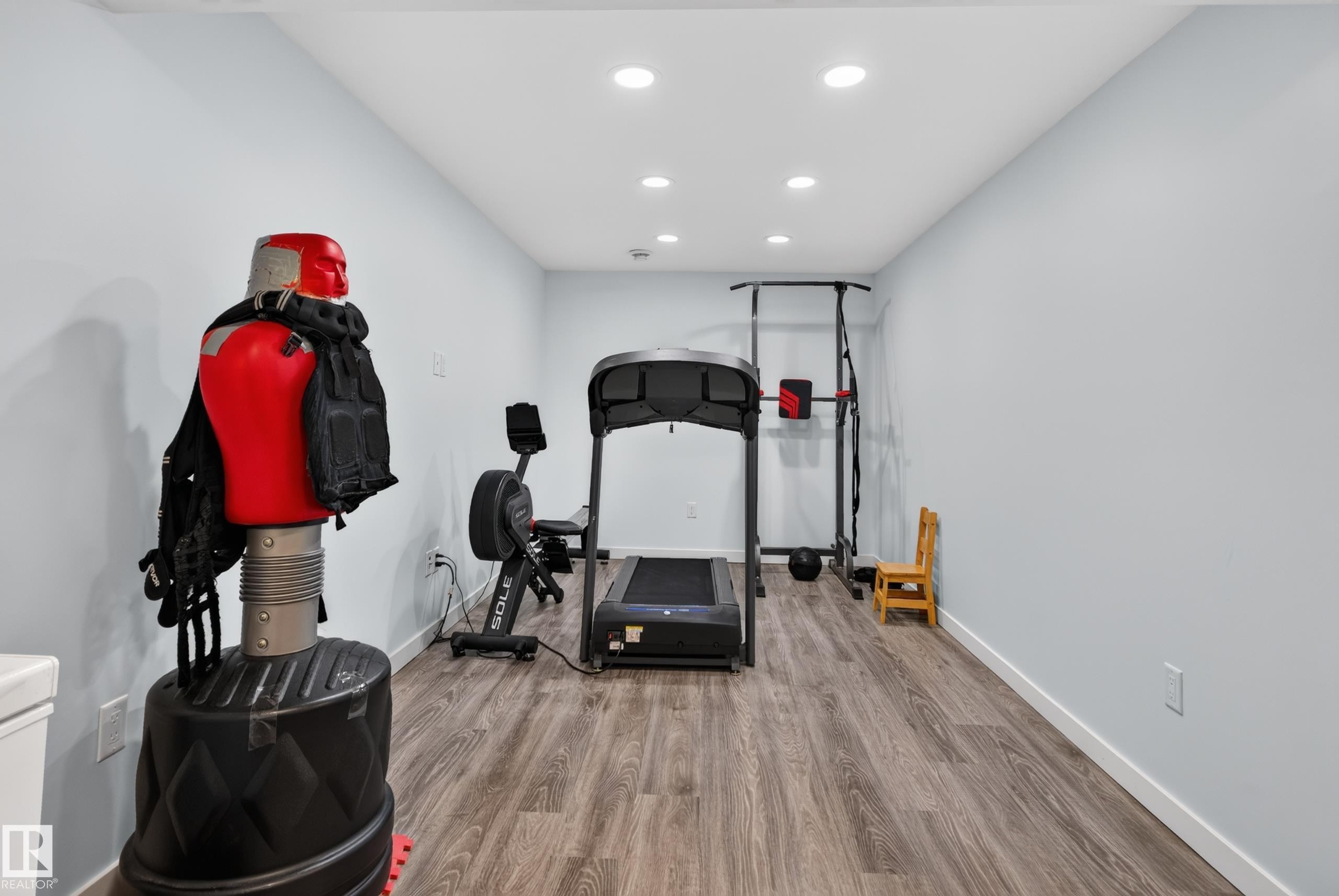 Recessed ceiling lighting, light-toned walls, and wood-finish flooring - 17363 120 Street Nw, Edmonton, AB