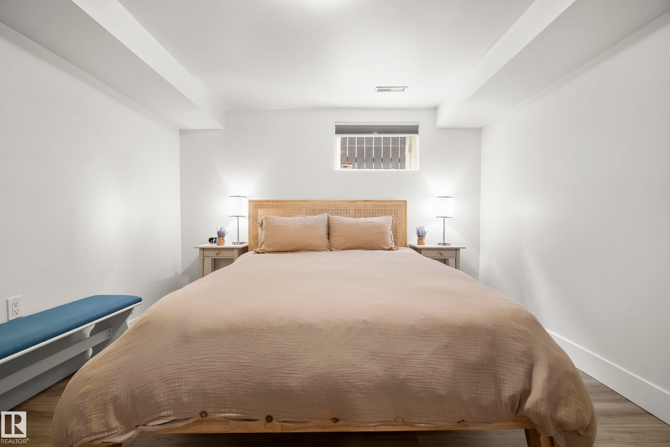 Recessed lighting, wood-finish flooring, and crisp white walls - 11006 64 Avenue Nw, Edmonton, AB