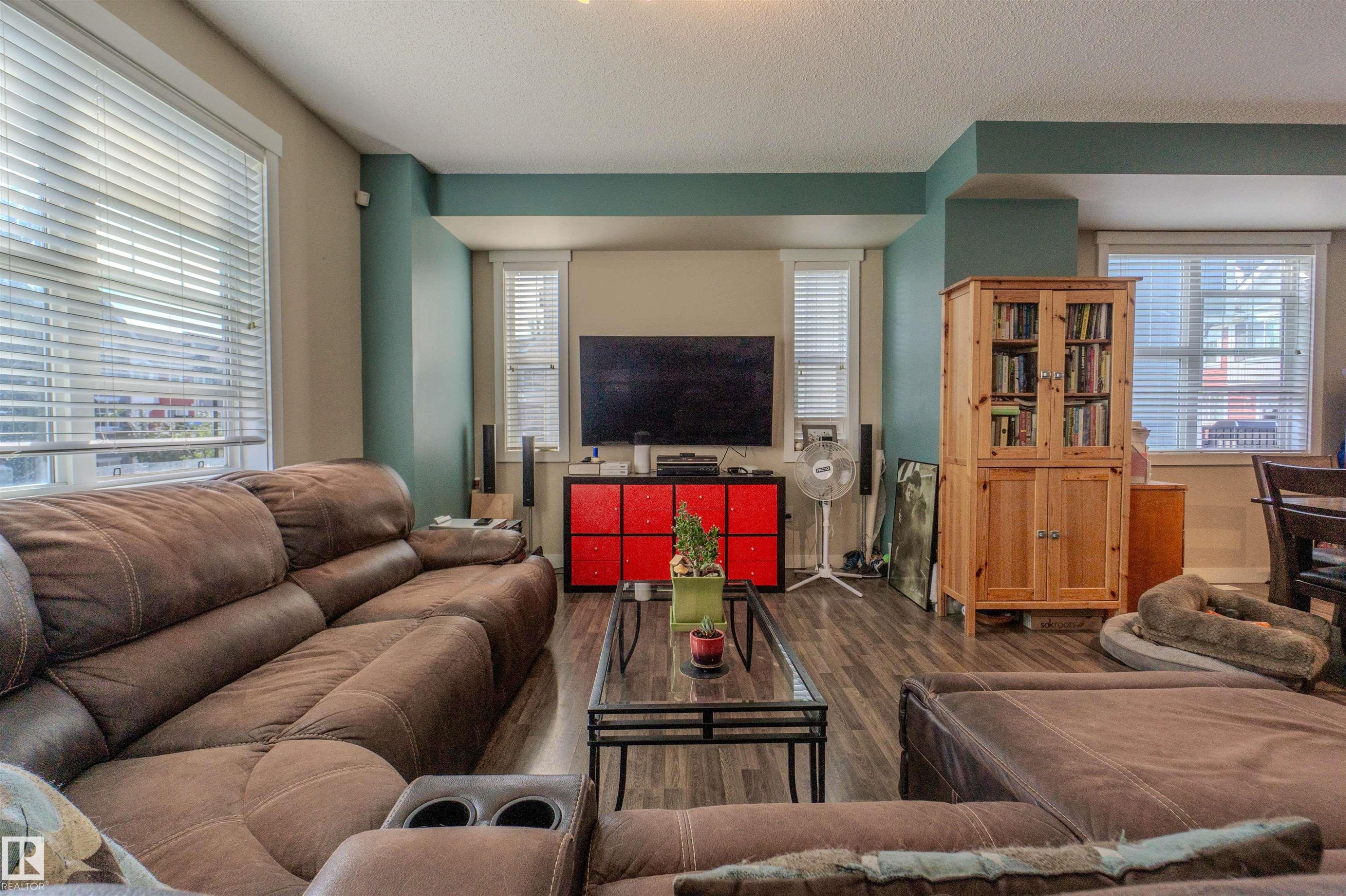 Spacious interior with wood-finish flooring - #75 8315 180 Av Nw, Edmonton, AB