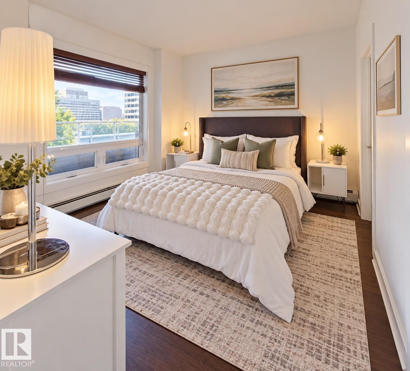 Expansive window with horizontal blinds, dark wood-finish flooring, white walls, and built-in baseboard heating - #605 10152 104 St Nw, Edmonton, AB