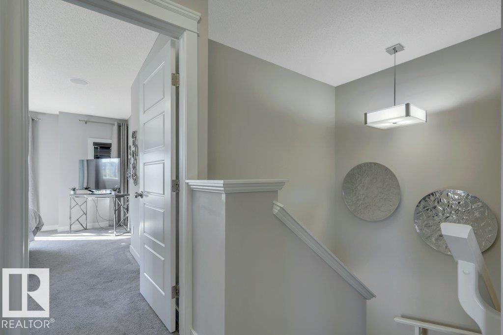 Leading to Primary Suite - 160 Desrochers Gate Sw, Edmonton, AB