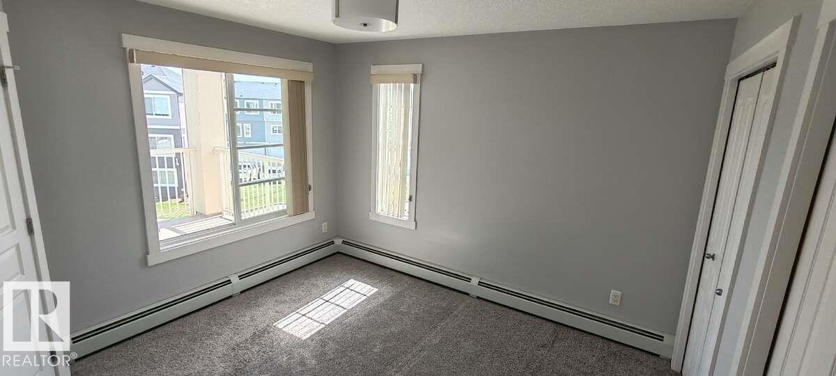 #302 3670 139 Av Nw, Edmonton, AB - Indoor Photo Showing Other Room