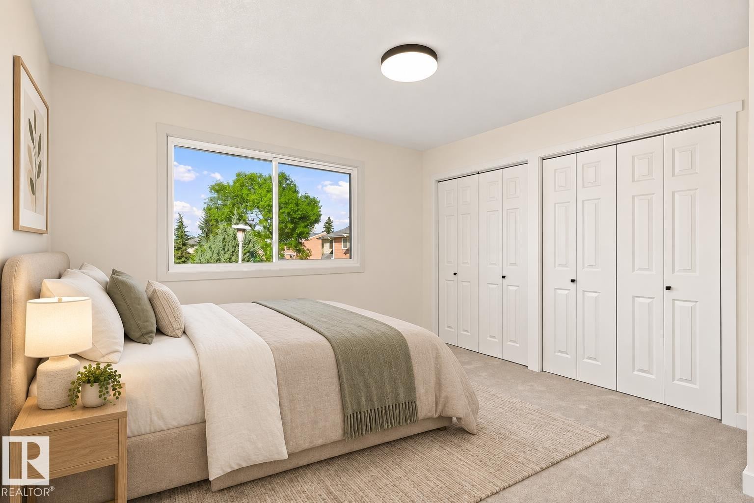Recessed ceiling light, white panel bi-fold doors, white window trim, and wall-to-wall carpeting - 17325 85 Avenue Nw, Edmonton, AB