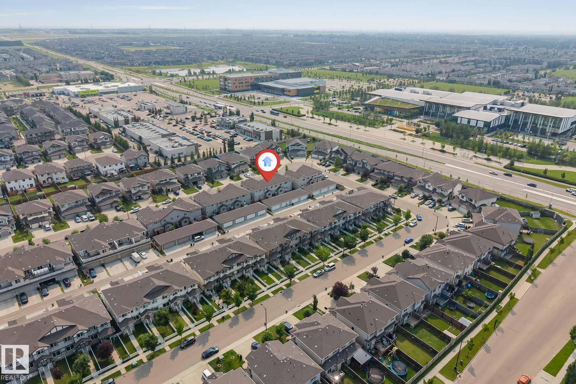 Aerial perspective showcasing a residential development with structured street layouts - 1514 26 Avenue Nw, Edmonton, AB - Outdoor With View