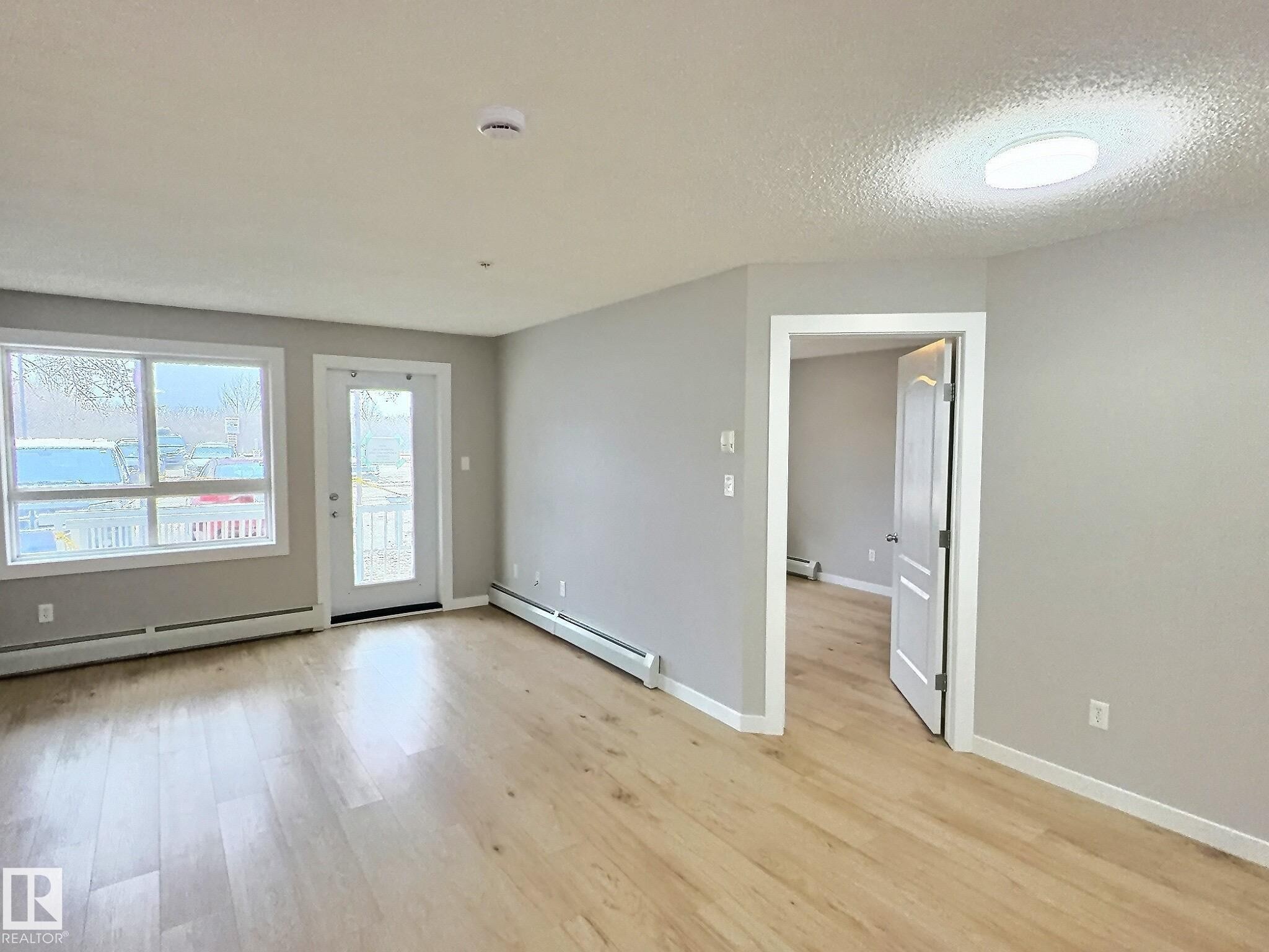 #103 5350 199 St Nw, Edmonton, AB - Indoor Photo Showing Other Room