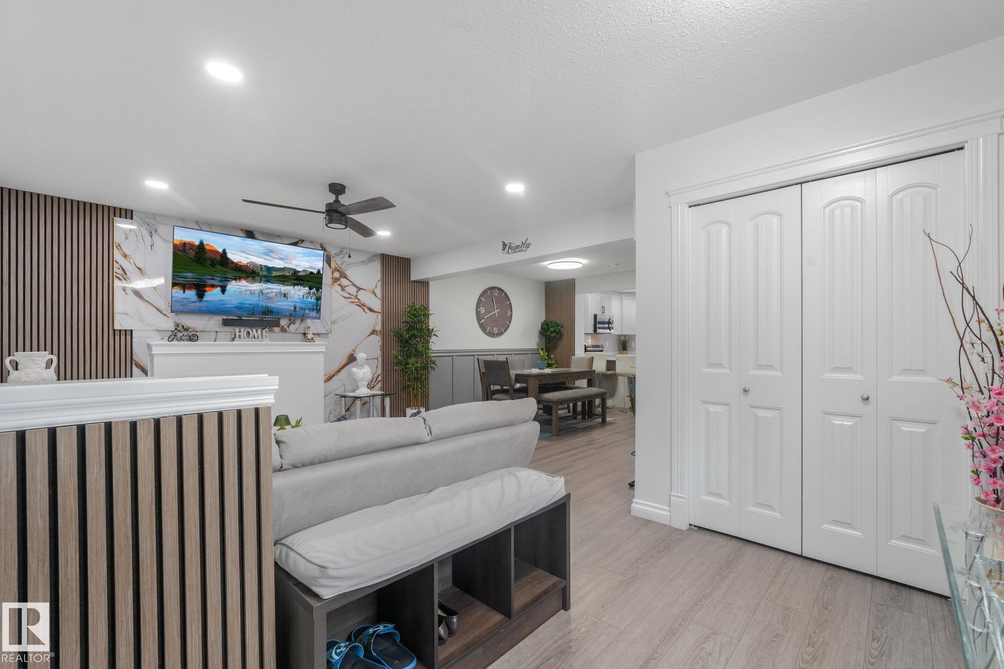 Wood-finish flooring throughout, complemented by recessed ceiling lighting - 12843 67 Street Nw, Edmonton, AB